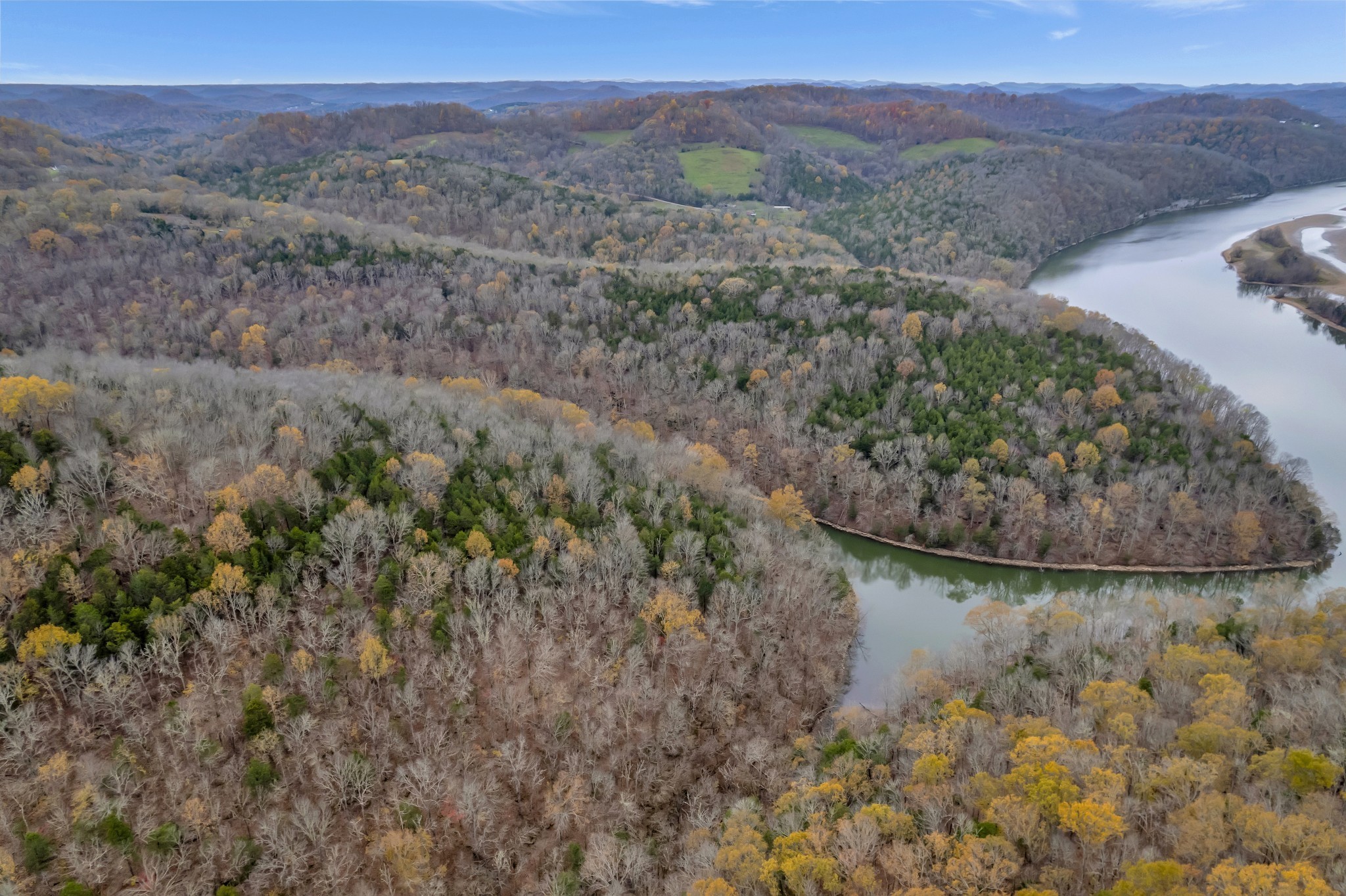 0 Huff Hollow Road Granville, TN 38564 - Photo 9 of 39 a view of a lake in middle of forest