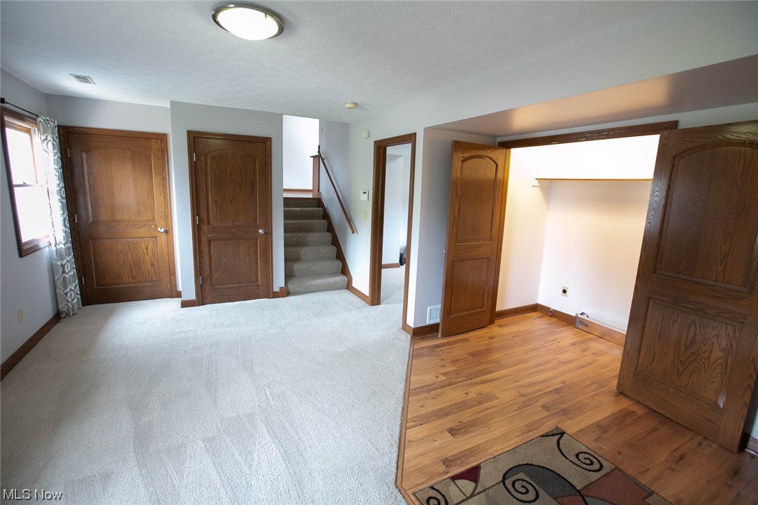 14711 Hatfield Road Rittman, OH 44270 - Photo 21 of 35 Entering from garage. 1st floor family room with laundry hookup.