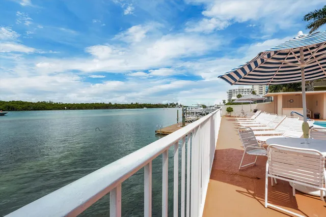 a bathroom with a shower a toilet and a shower