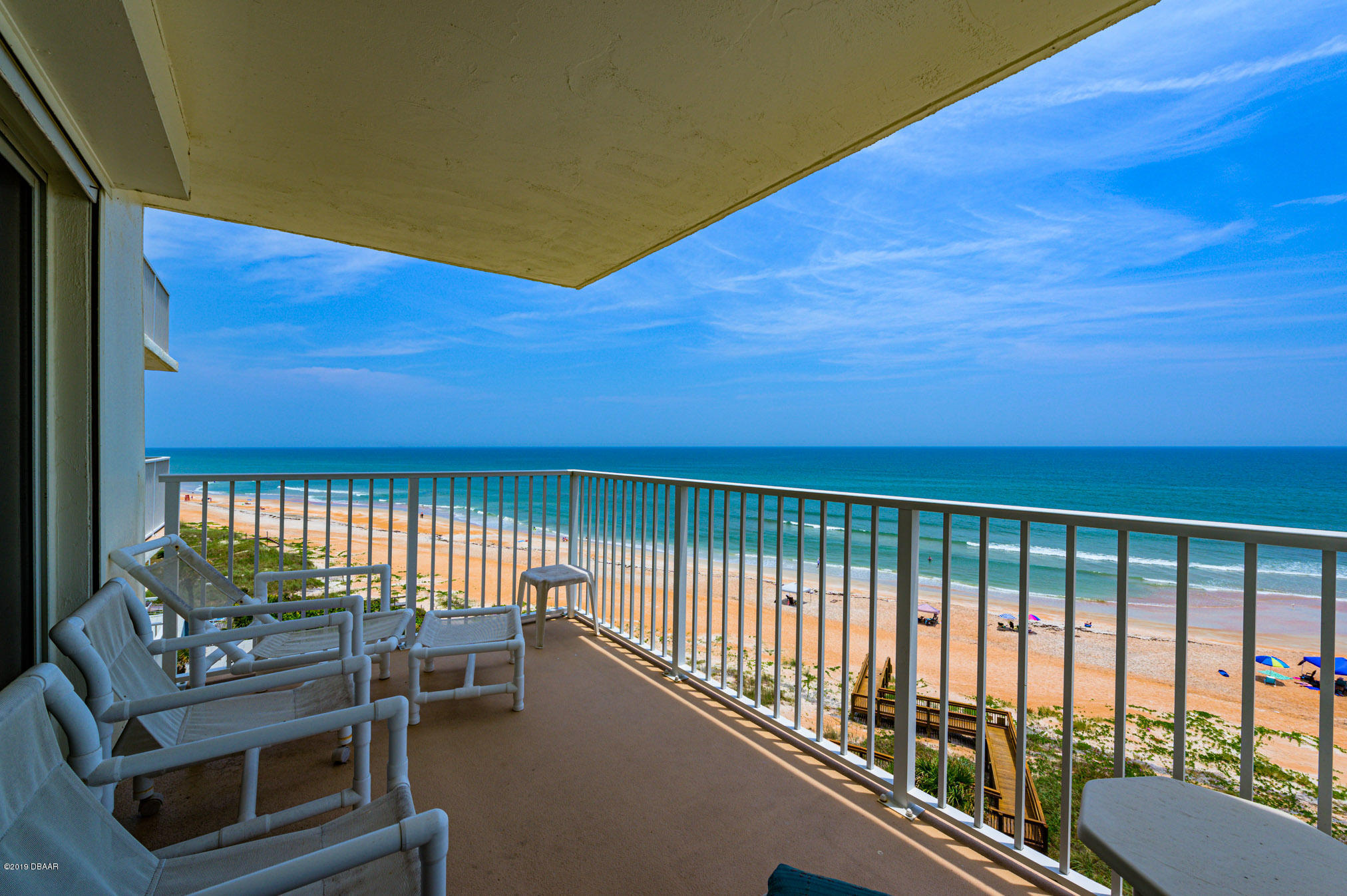 1183 Ocean Shore Boulevard, Unit 602 Ormond Beach, FL 32176 - Photo 18 of 27 a view of a balcony with chairs