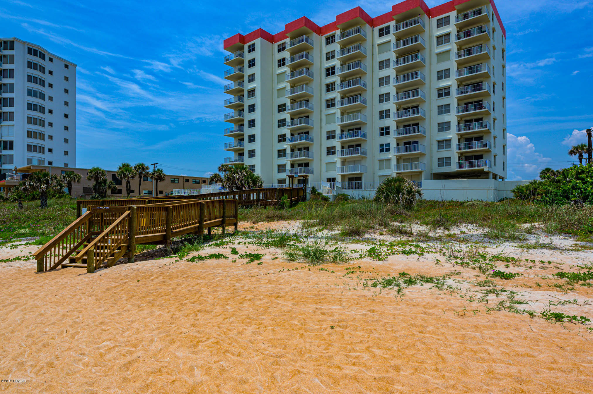 1183 Ocean Shore Boulevard, Unit 602 Ormond Beach, FL 32176 - Photo 26 of 27 a view of a pool with a yard