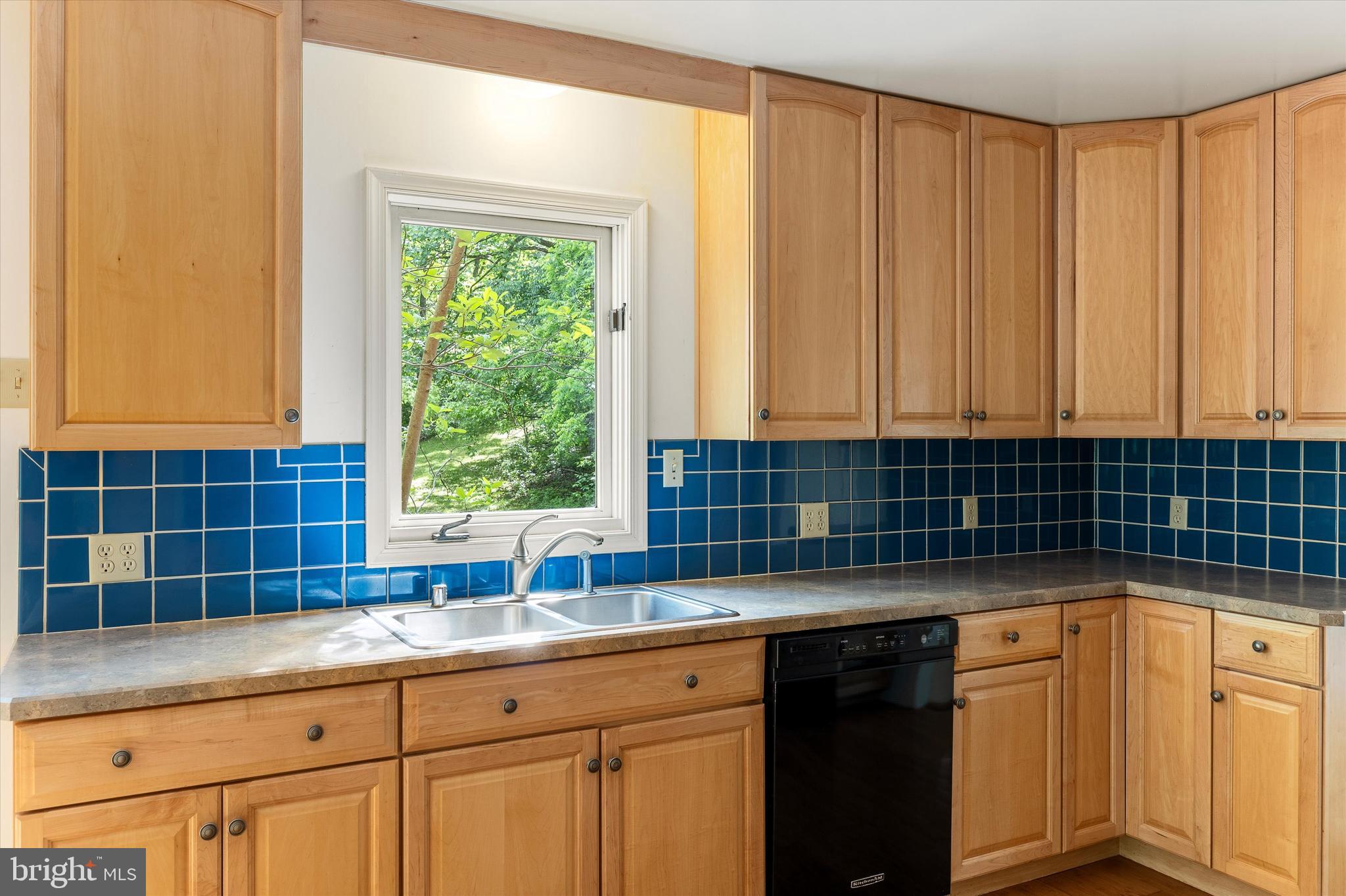 112 Old Forest Circle Winchester, VA 22602 - Photo 23 of 77 a kitchen with a sink and a window