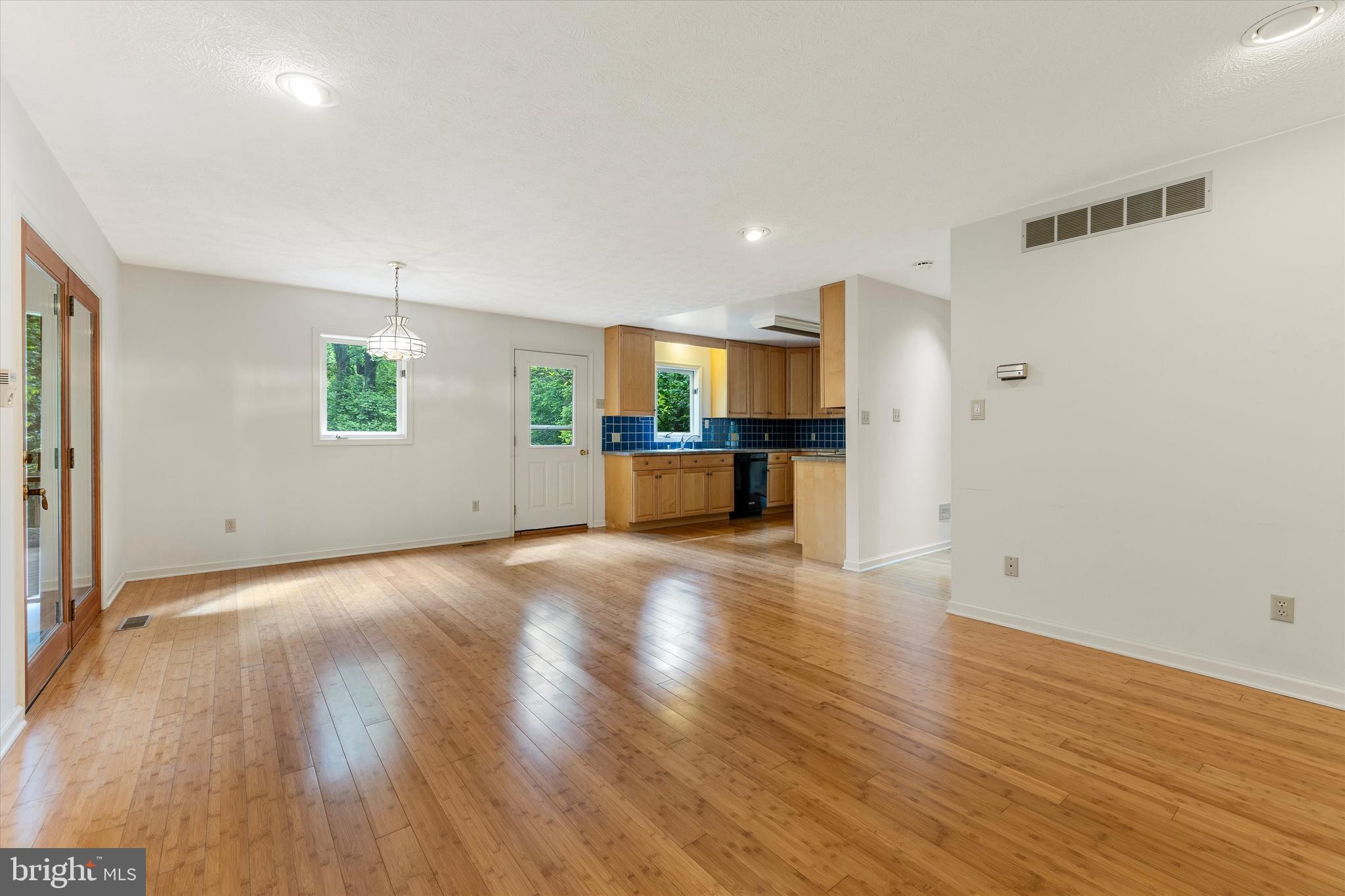 112 Old Forest Circle Winchester, VA 22602 - Photo 25 of 77 a view of a kitchen with a sink and a refrigerator