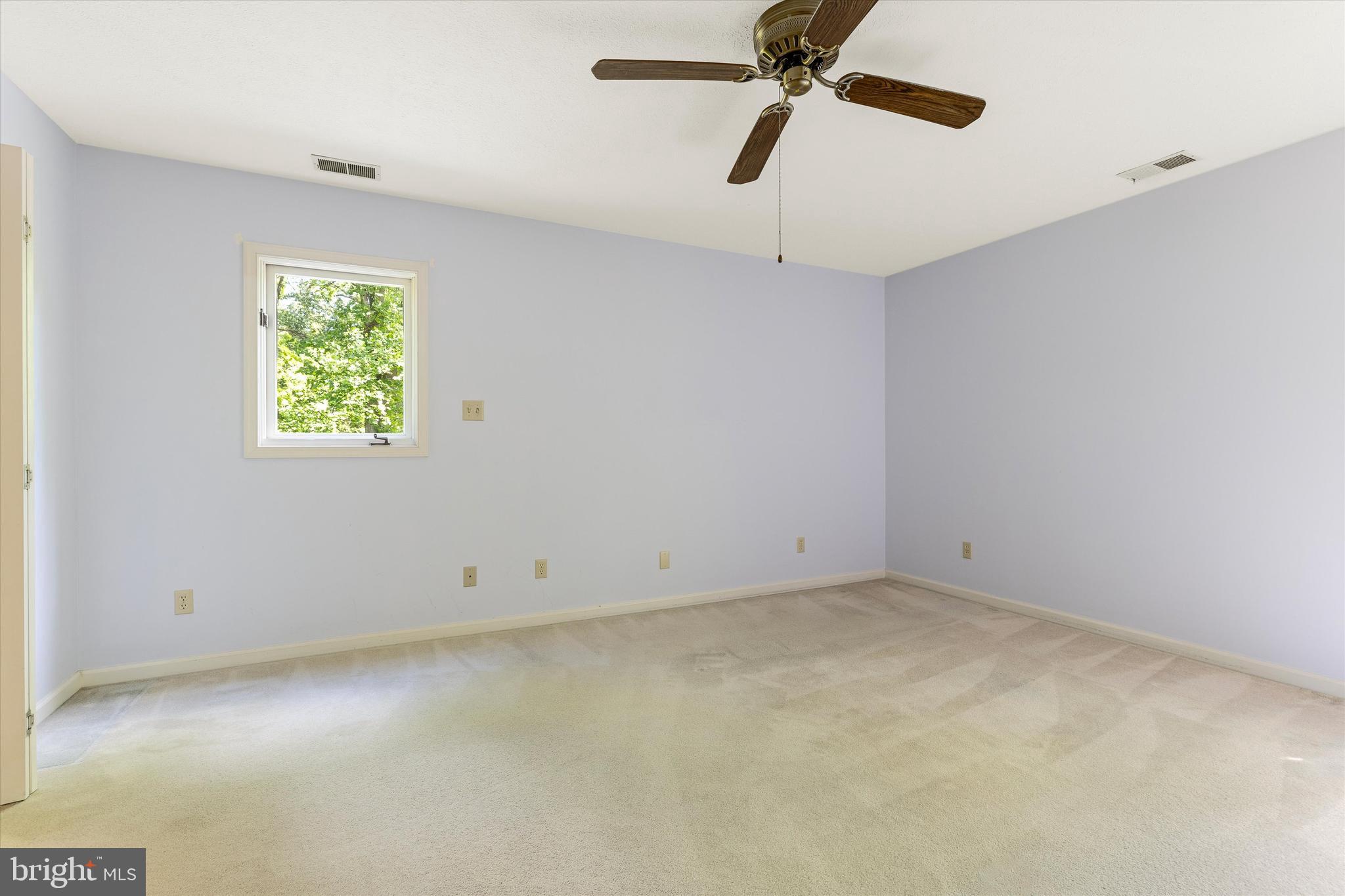 112 Old Forest Circle Winchester, VA 22602 - Photo 28 of 77 an empty room with windows and fan