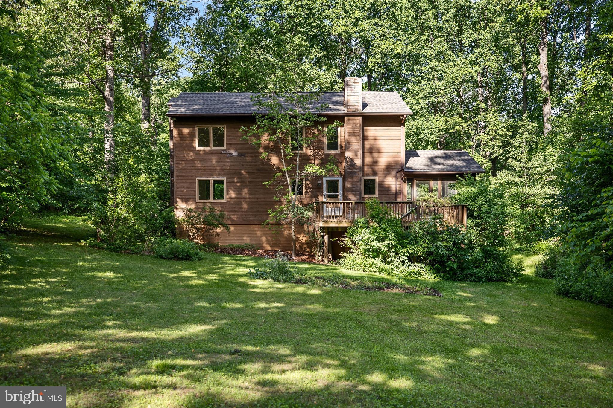 112 Old Forest Circle Winchester, VA 22602 - Photo 61 of 77 a front view of a house with a yard