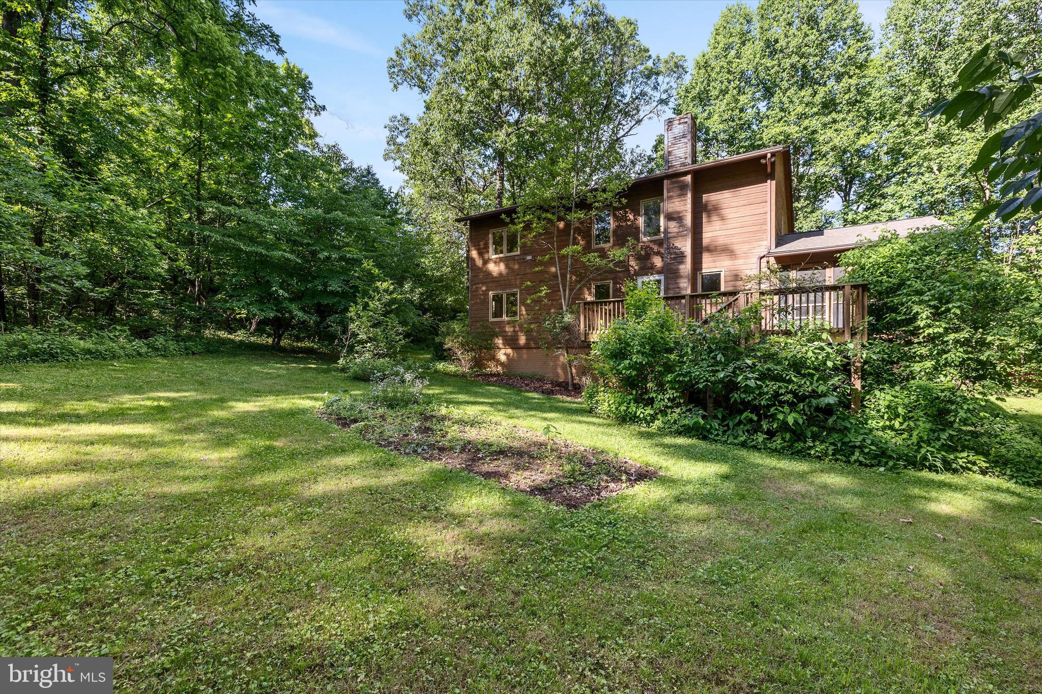112 Old Forest Circle Winchester, VA 22602 - Photo 62 of 77 a backyard of a house with lots of green space
