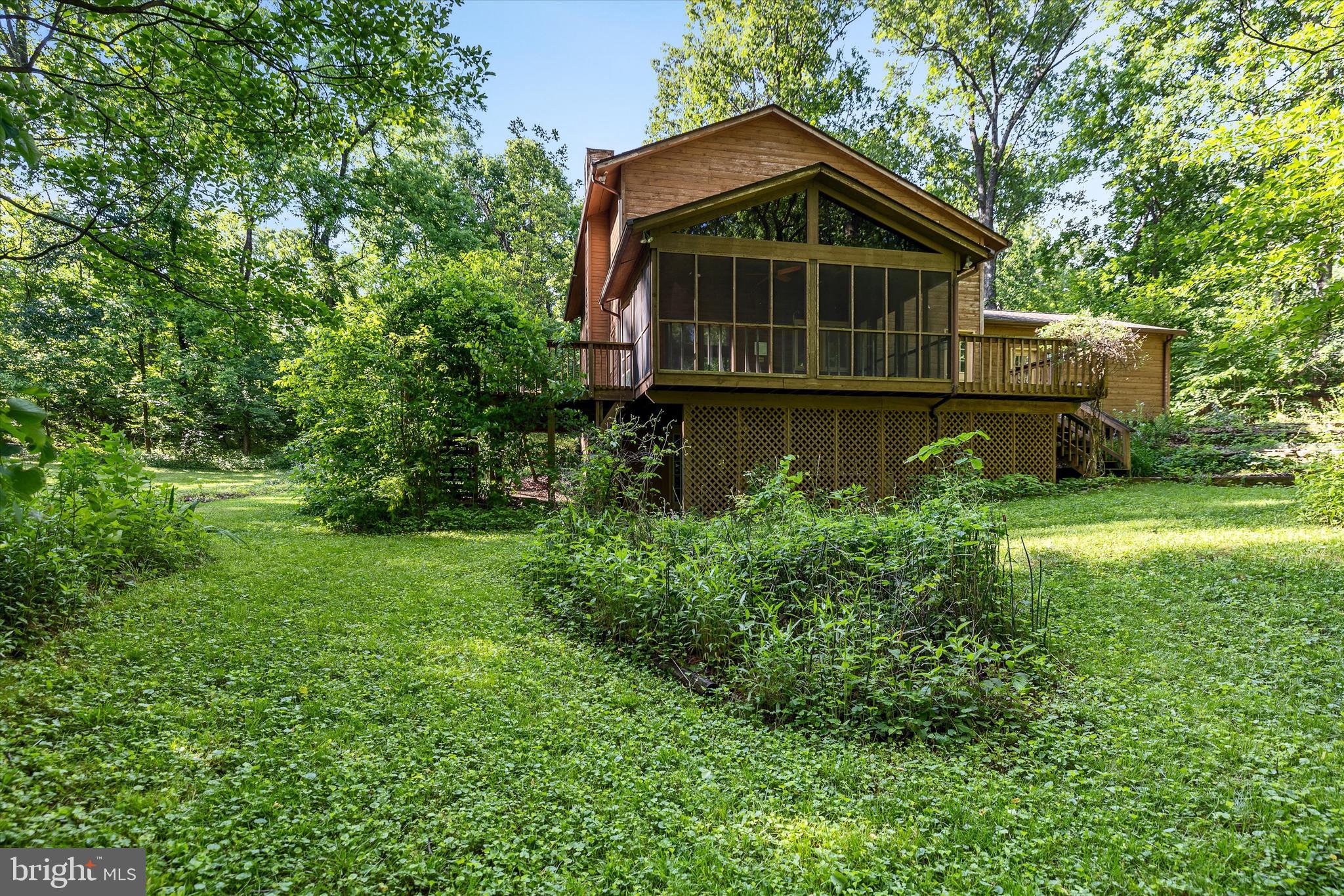 112 Old Forest Circle Winchester, VA 22602 - Photo 63 of 77 a front view of a house with a yard