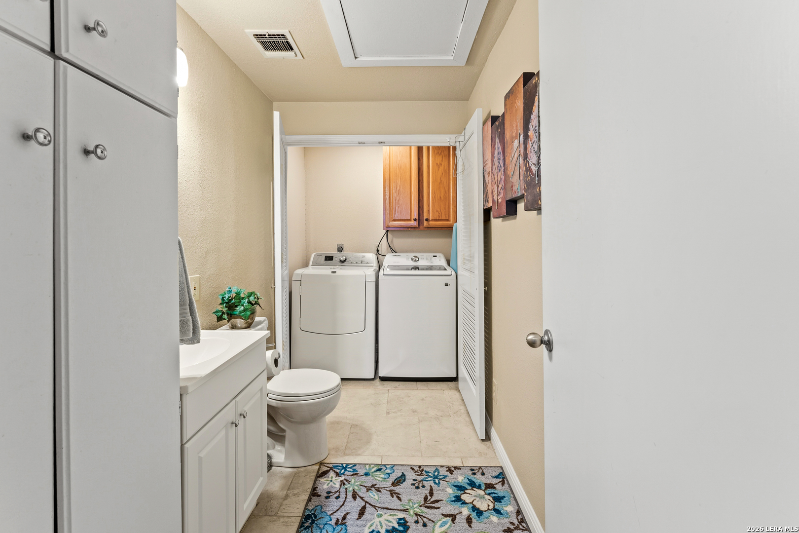 4515 Stapper Road St. Hedwig, TX 78152 - Photo 31 of 64 a bathroom with a sink toilet and shower