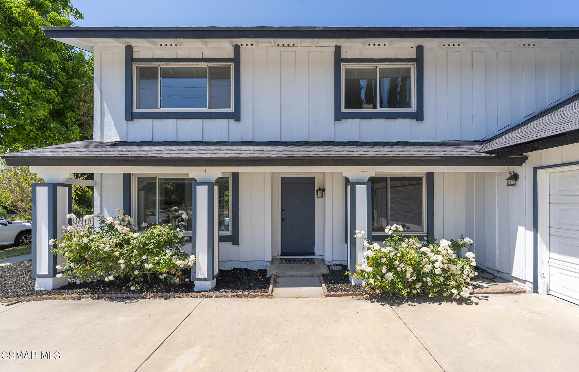 2305 Cochran Street Simi Valley, CA 93065 - Photo 3 of 43 a view of a house with potted plants