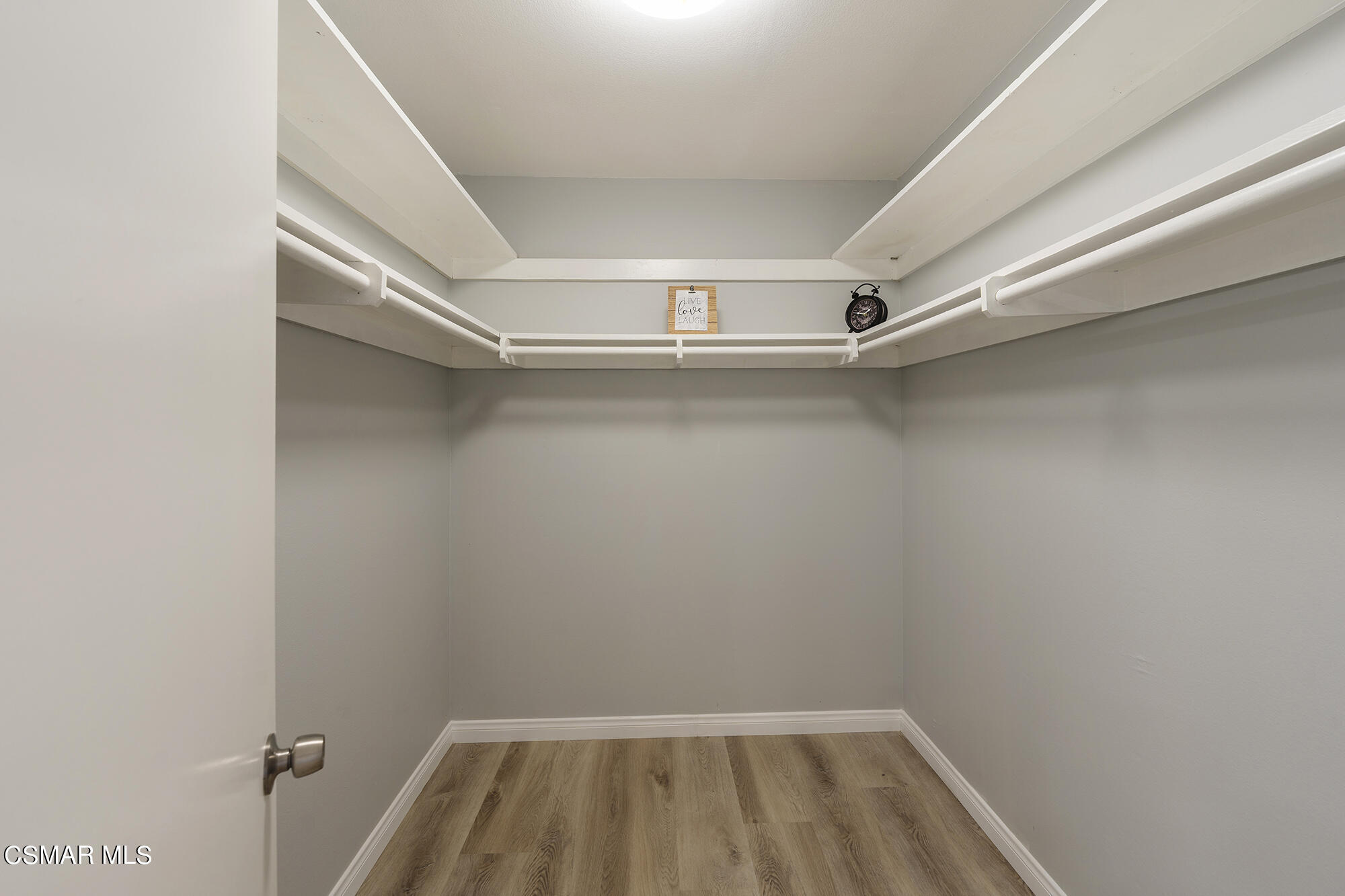 2305 Cochran Street Simi Valley, CA 93065 - Photo 34 of 43 a view of room with racks on the wall