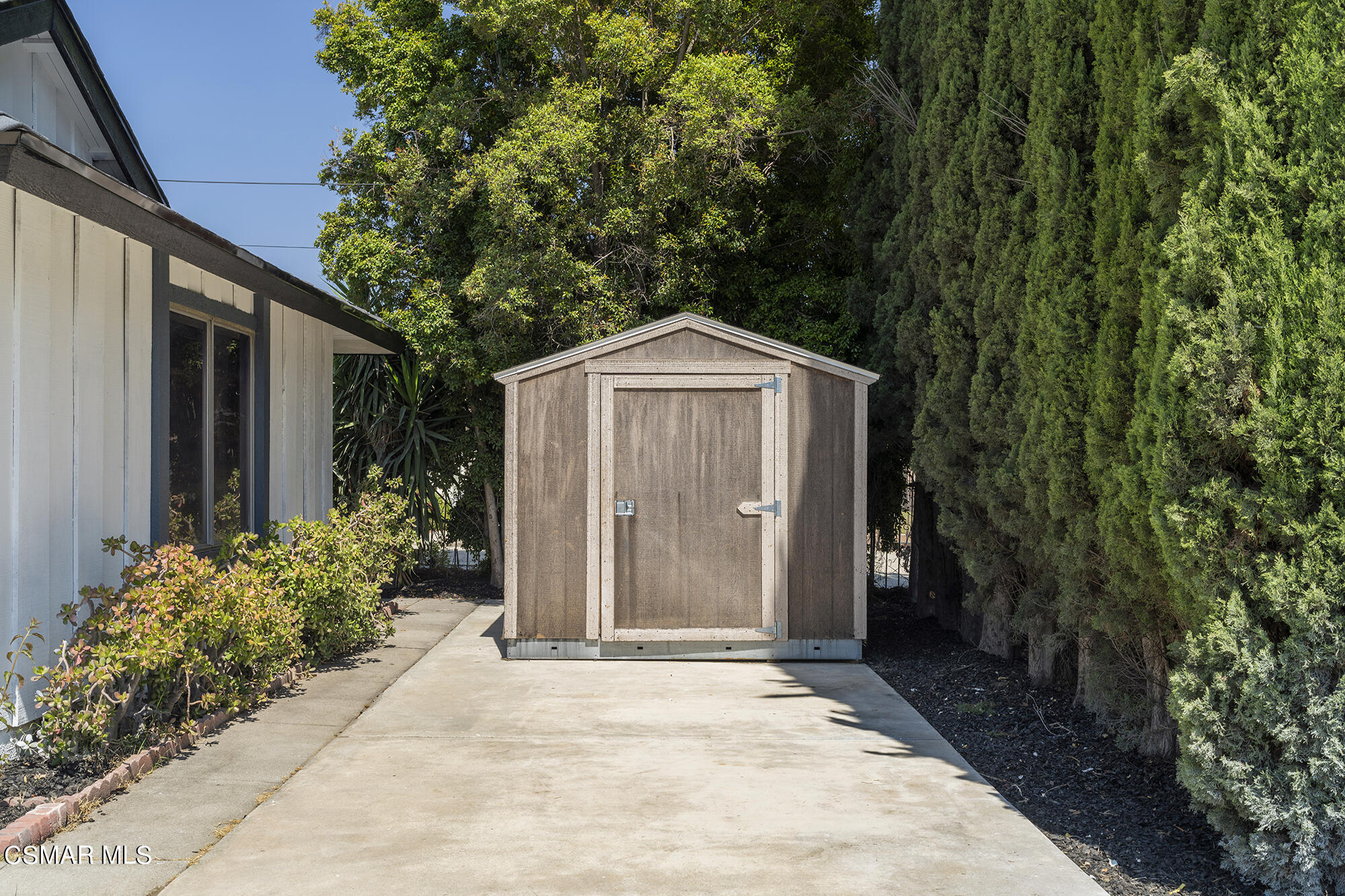 2305 Cochran Street Simi Valley, CA 93065 - Photo 4 of 43 a front view of a house with garden