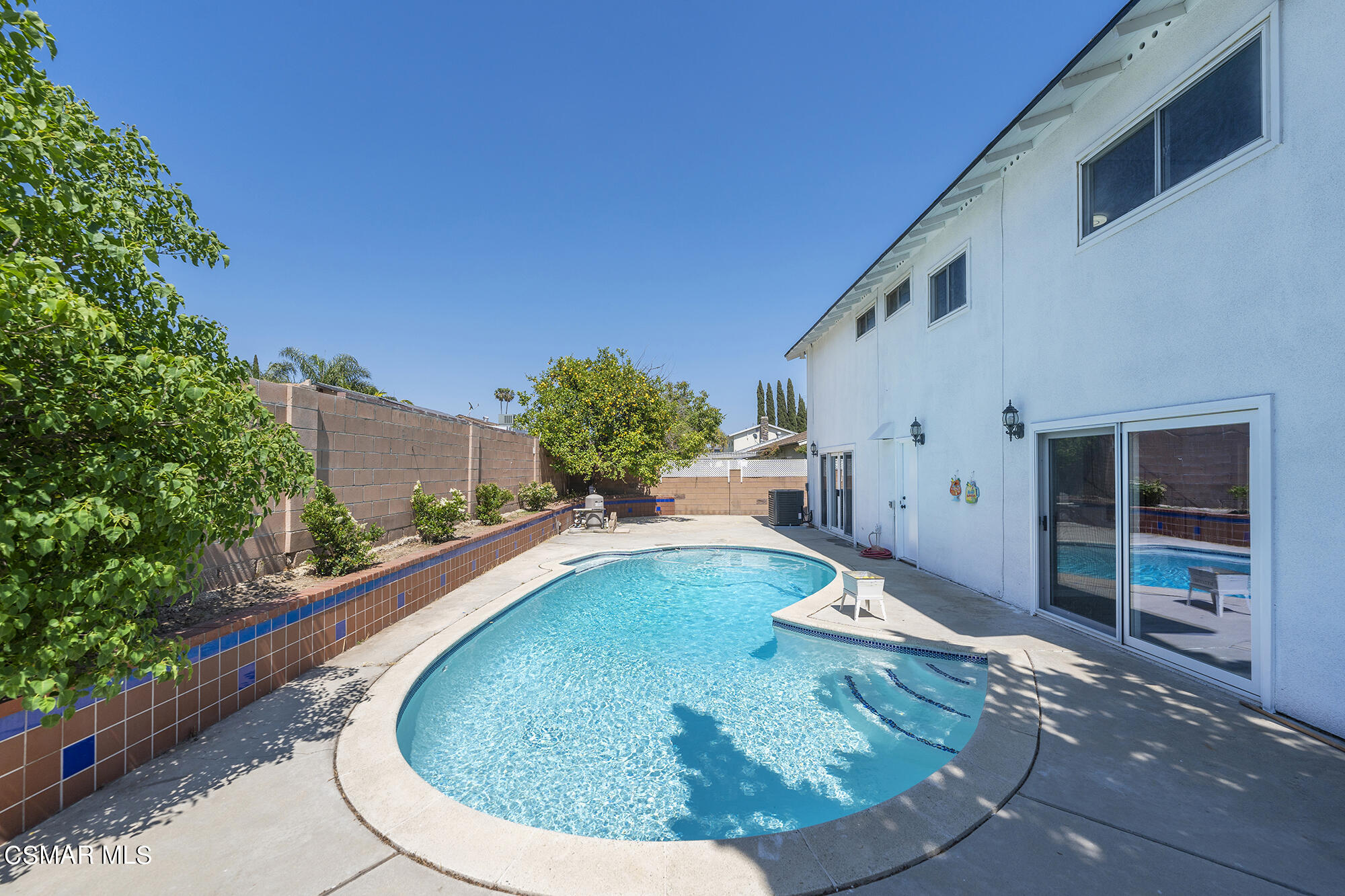2305 Cochran Street Simi Valley, CA 93065 - Photo 41 of 43 a view of a swimming pool with an outdoor seating
