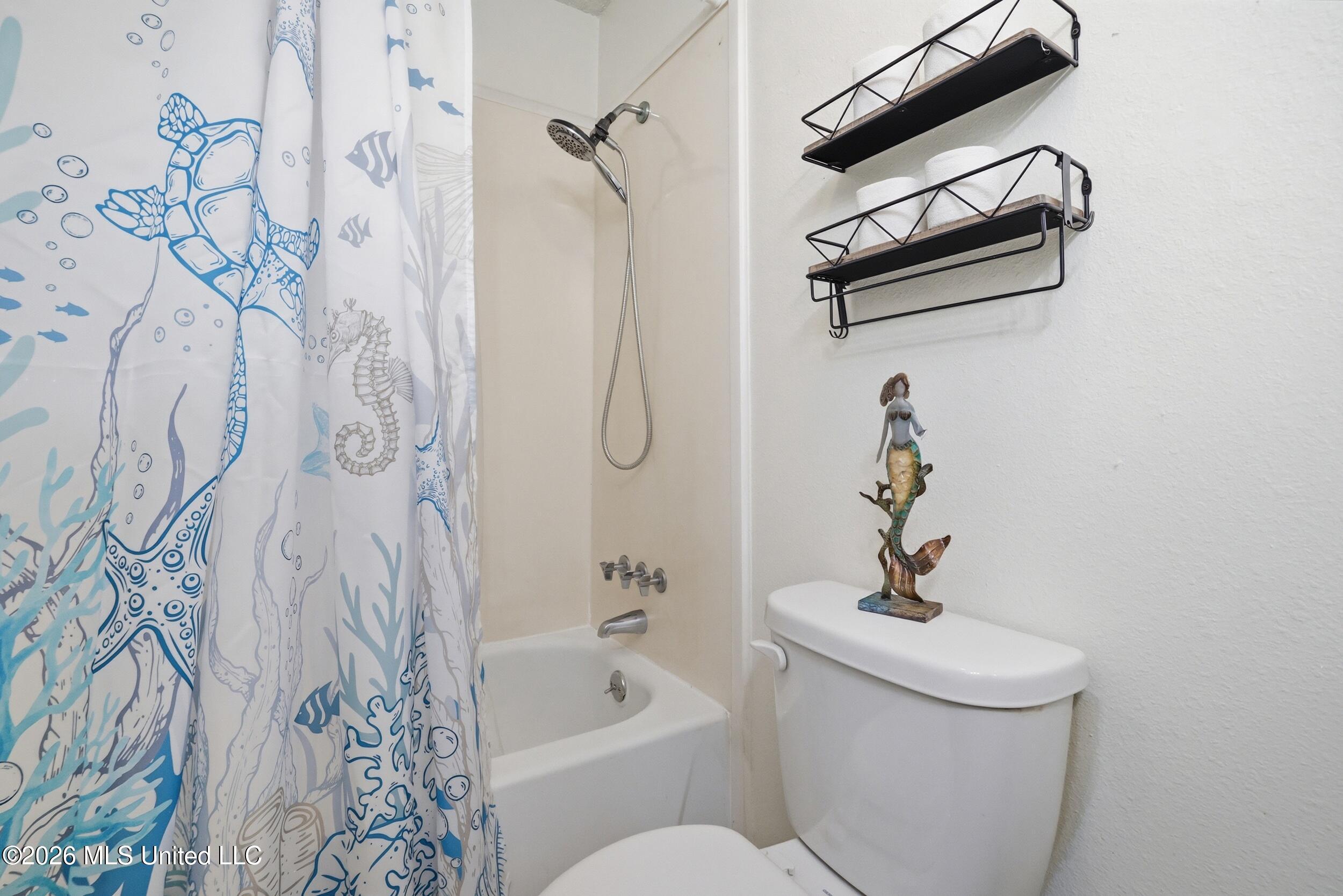 1550 East 2nd Street, Unit R105 Pass Christian, MS 39571 - Photo 17 of 36 20_r6__4873