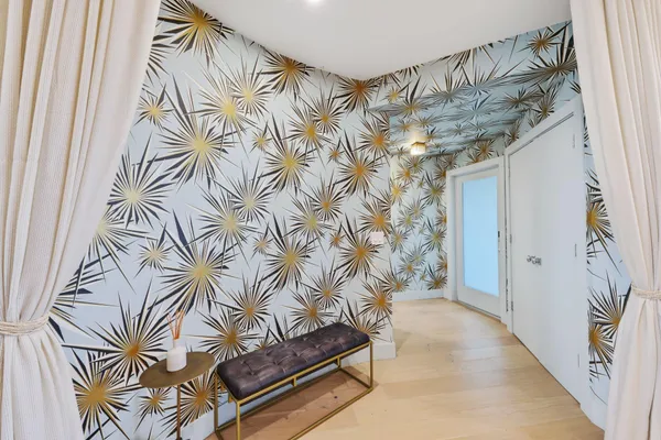 a entryway with a bench