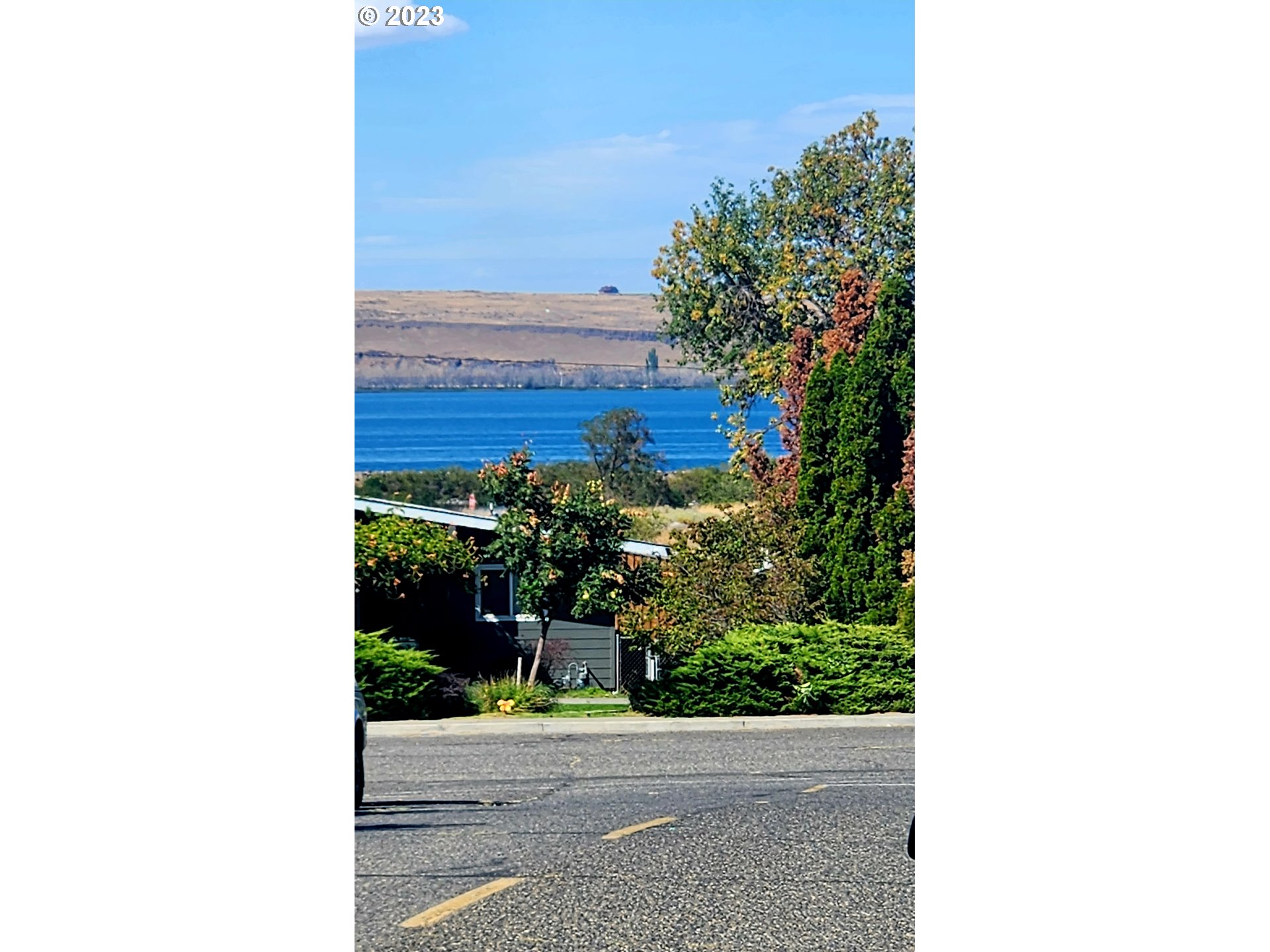 301 Northwest 3rd Street Boardman, OR 97818 - Photo 1 of 31 a view of a bench in front of a door