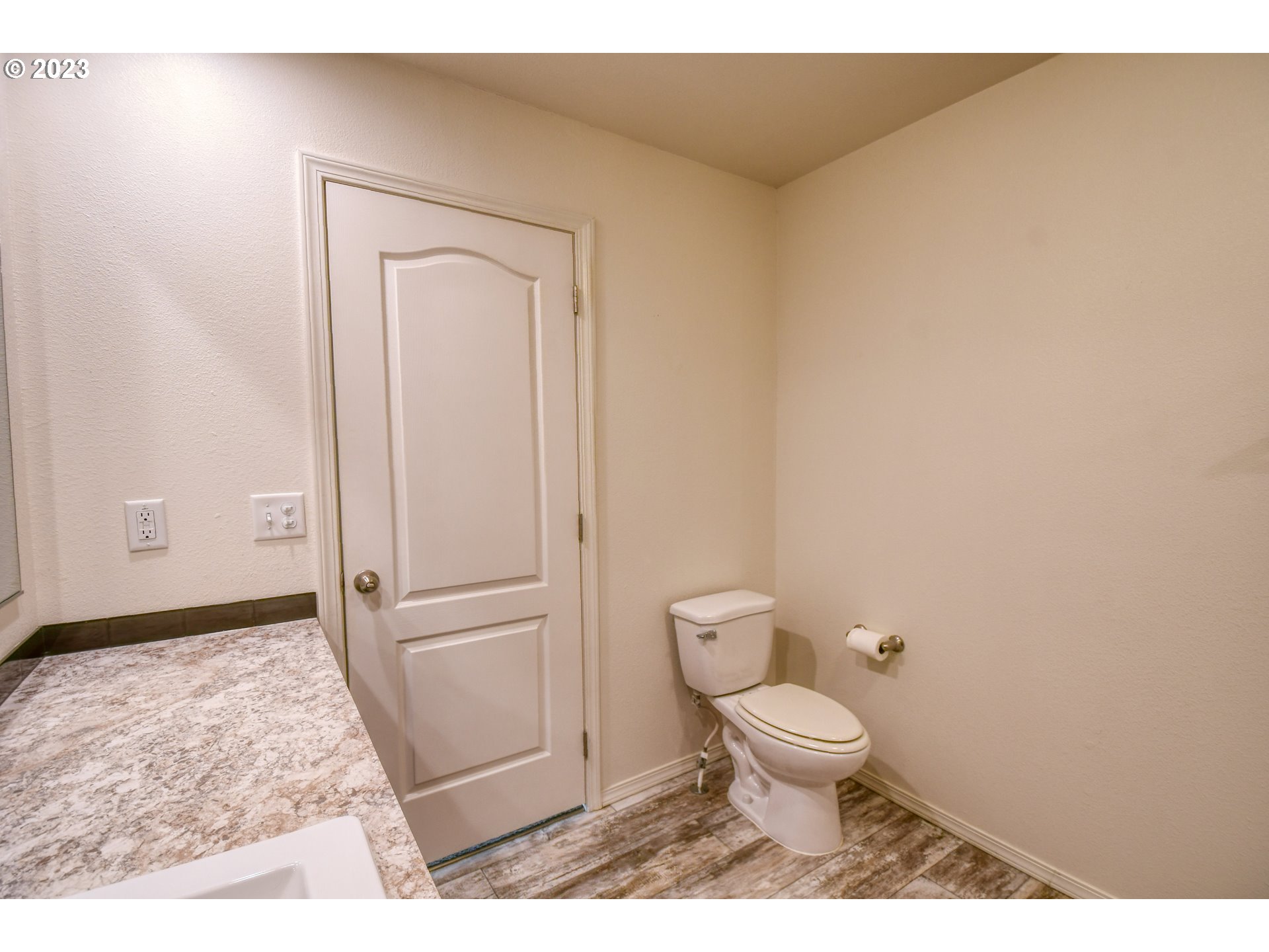301 Northwest 3rd Street Boardman, OR 97818 - Photo 16 of 31 a bathroom with a toilet