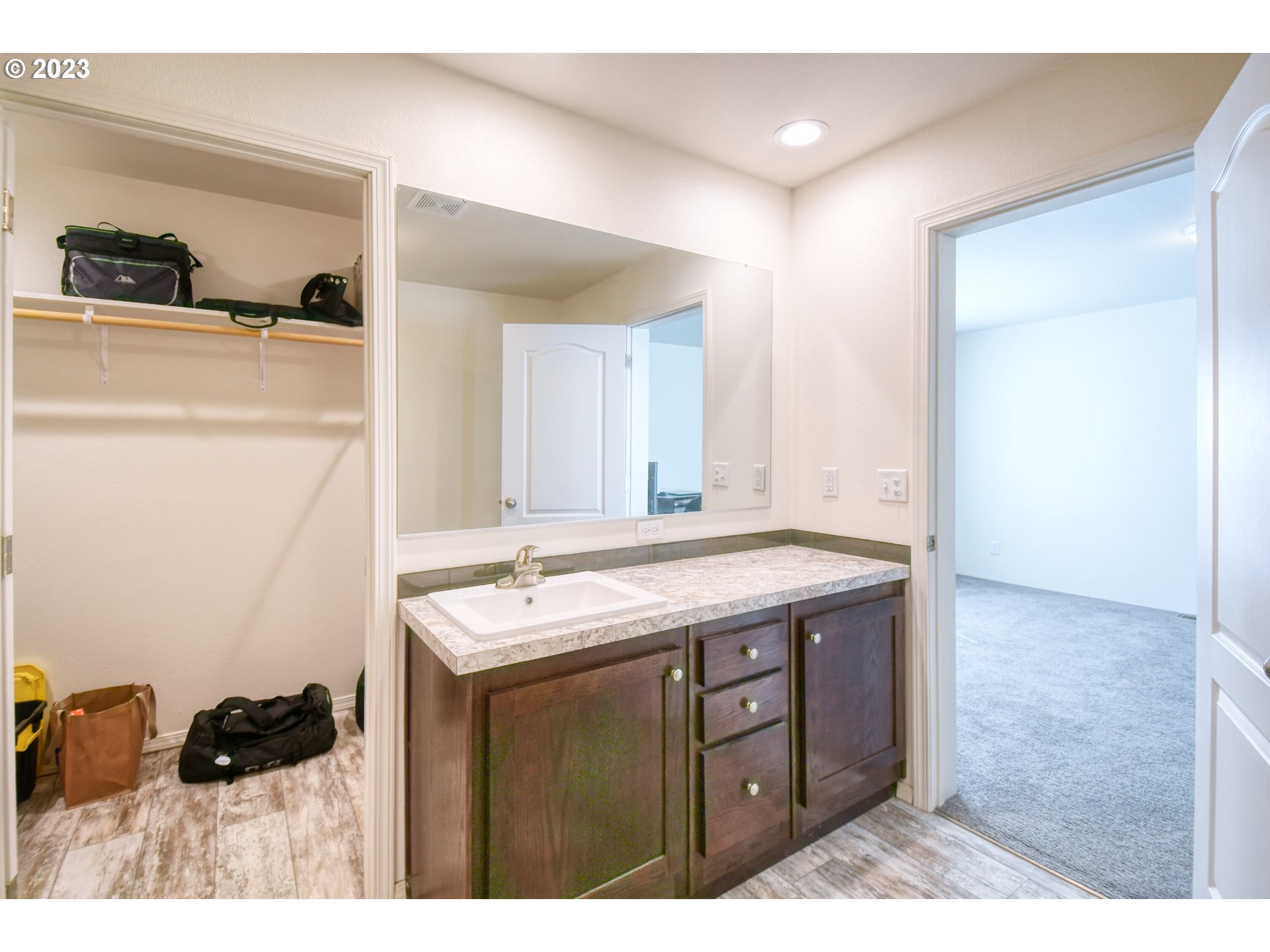 301 Northwest 3rd Street Boardman, OR 97818 - Photo 17 of 31 a bathroom with a sink and a mirror