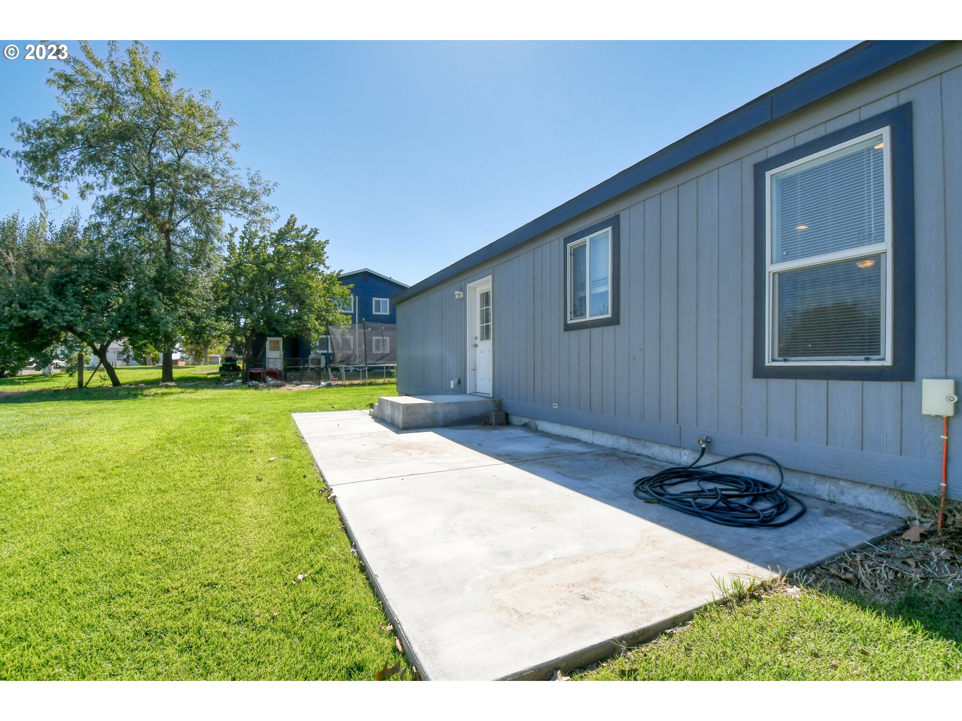 301 Northwest 3rd Street Boardman, OR 97818 - Photo 27 of 31 a view of backyard of a house