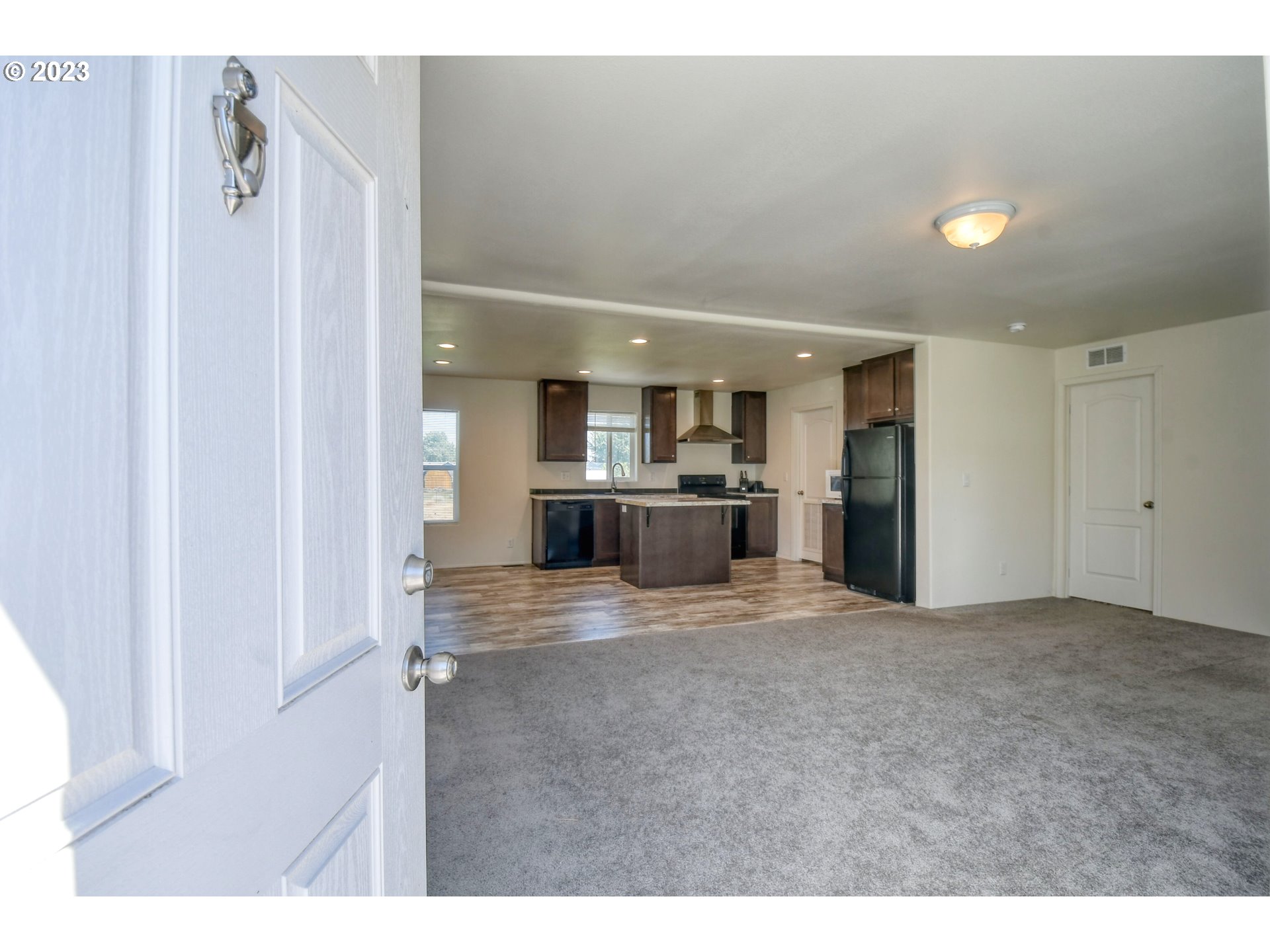 301 Northwest 3rd Street Boardman, OR 97818 - Photo 5 of 31 a view of a kitchen with a sink