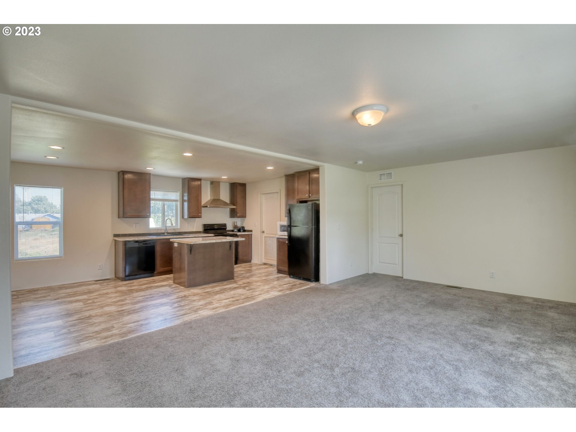 301 Northwest 3rd Street Boardman, OR 97818 - Photo 10 of 31 a view of a kitchen with a sink