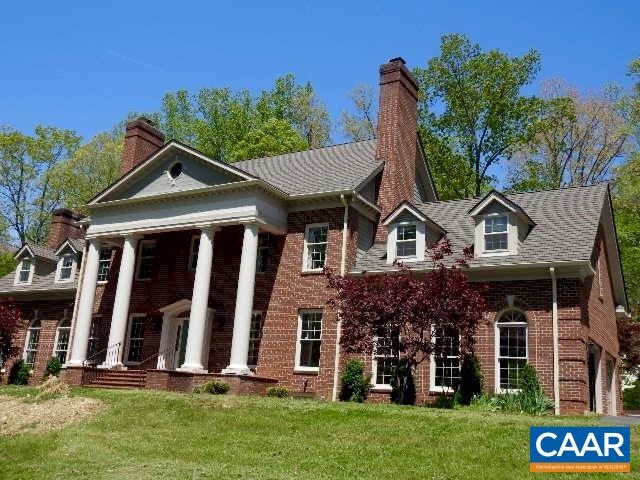 1855 Roslyn Ridge Road Charlottesville, VA 22901 - Photo 1 of 1 a front view of a house with a garden