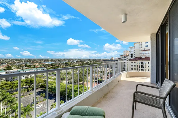 a view of a balcony with city view
