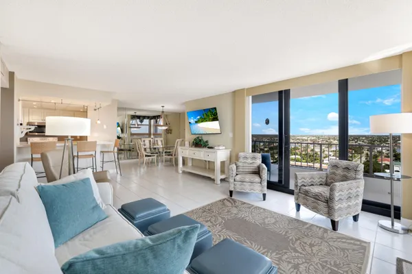 a living room with furniture and a table