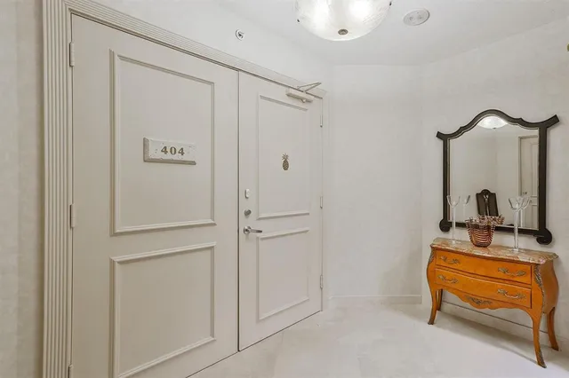 a view of a balcony with chairs