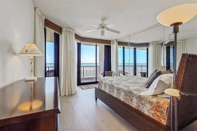 a kitchen with granite countertop white cabinets stainless steel appliances and sink
