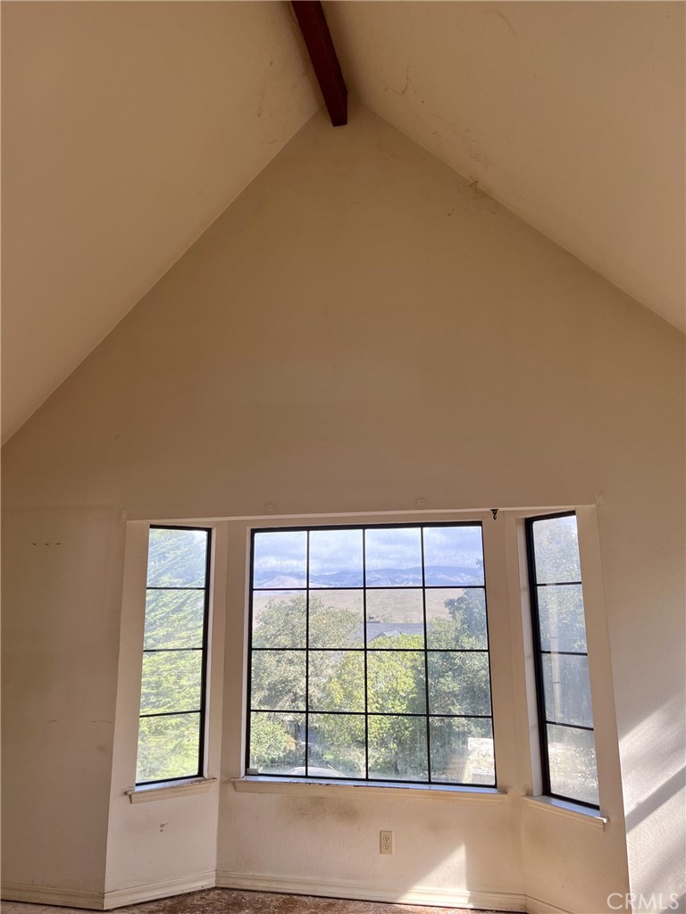 2387 Marjorie Place Cambria, CA 93428 - Photo 3 of 8 a view of an empty room with a large window