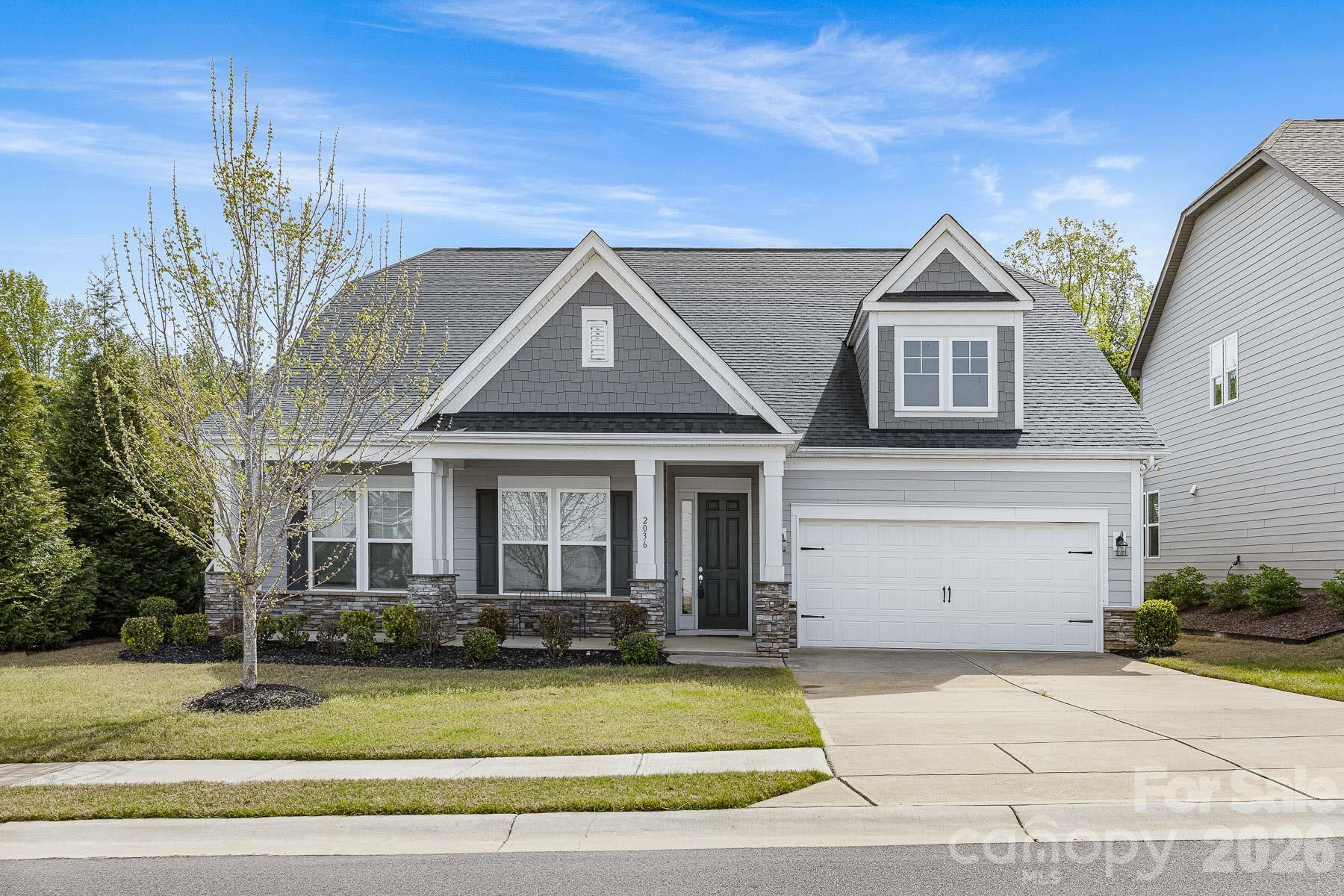 2036 Oliver Terrace Fort Mill, SC 29707 - Photo 1 of 41 a front view of a house with a yard