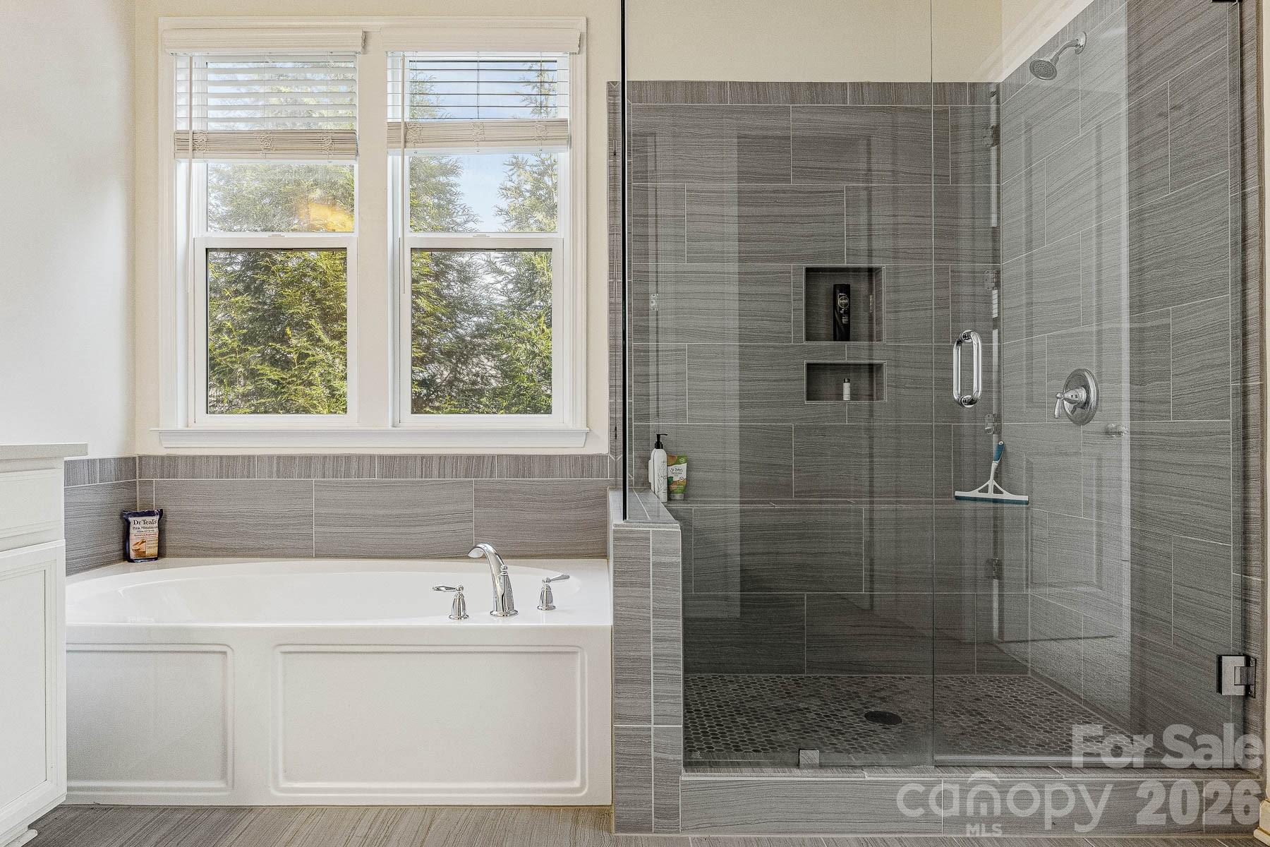 2036 Oliver Terrace Fort Mill, SC 29707 - Photo 23 of 41 a white bath tub sitting next to a shower