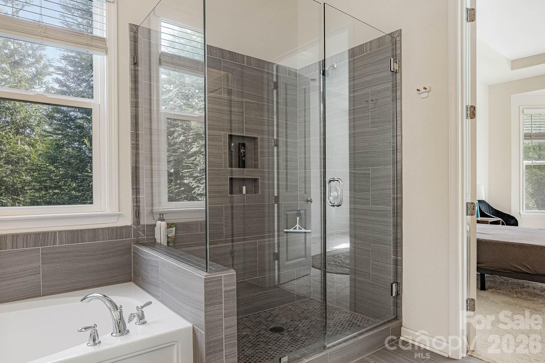 2036 Oliver Terrace Fort Mill, SC 29707 - Photo 24 of 41 a bathroom with a tub shower and sink