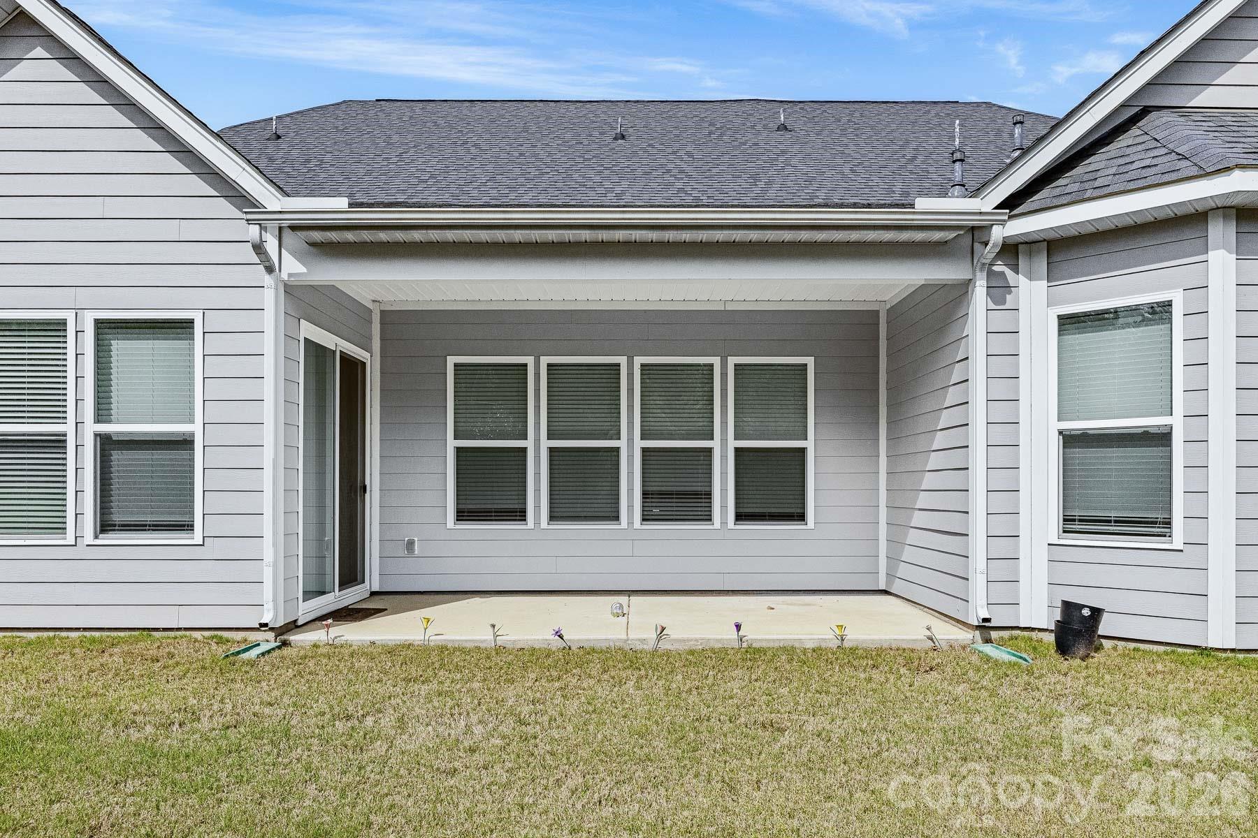 2036 Oliver Terrace Fort Mill, SC 29707 - Photo 39 of 41 a view of a house with a yard