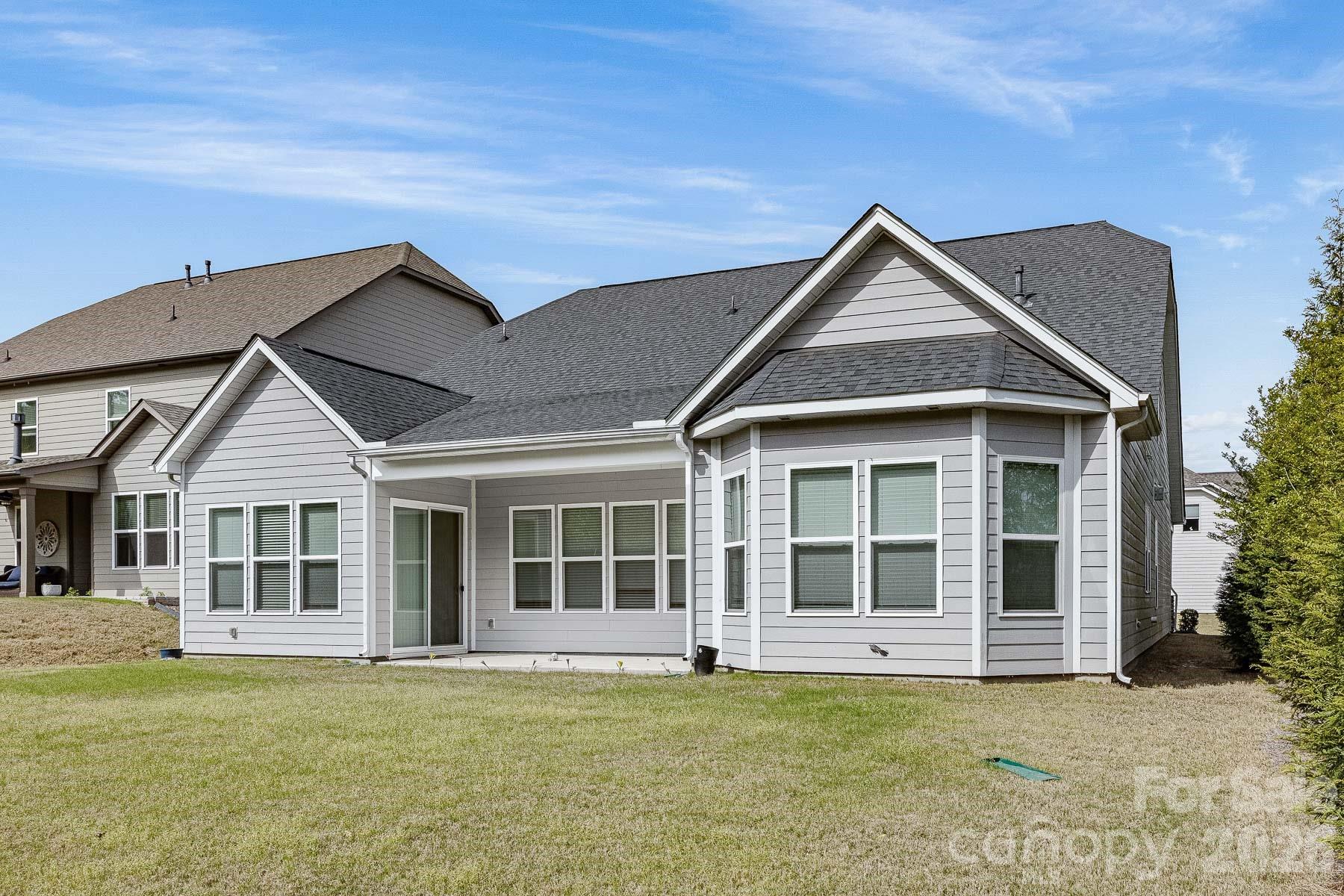 2036 Oliver Terrace Fort Mill, SC 29707 - Photo 40 of 41 a front view of a house with a garden