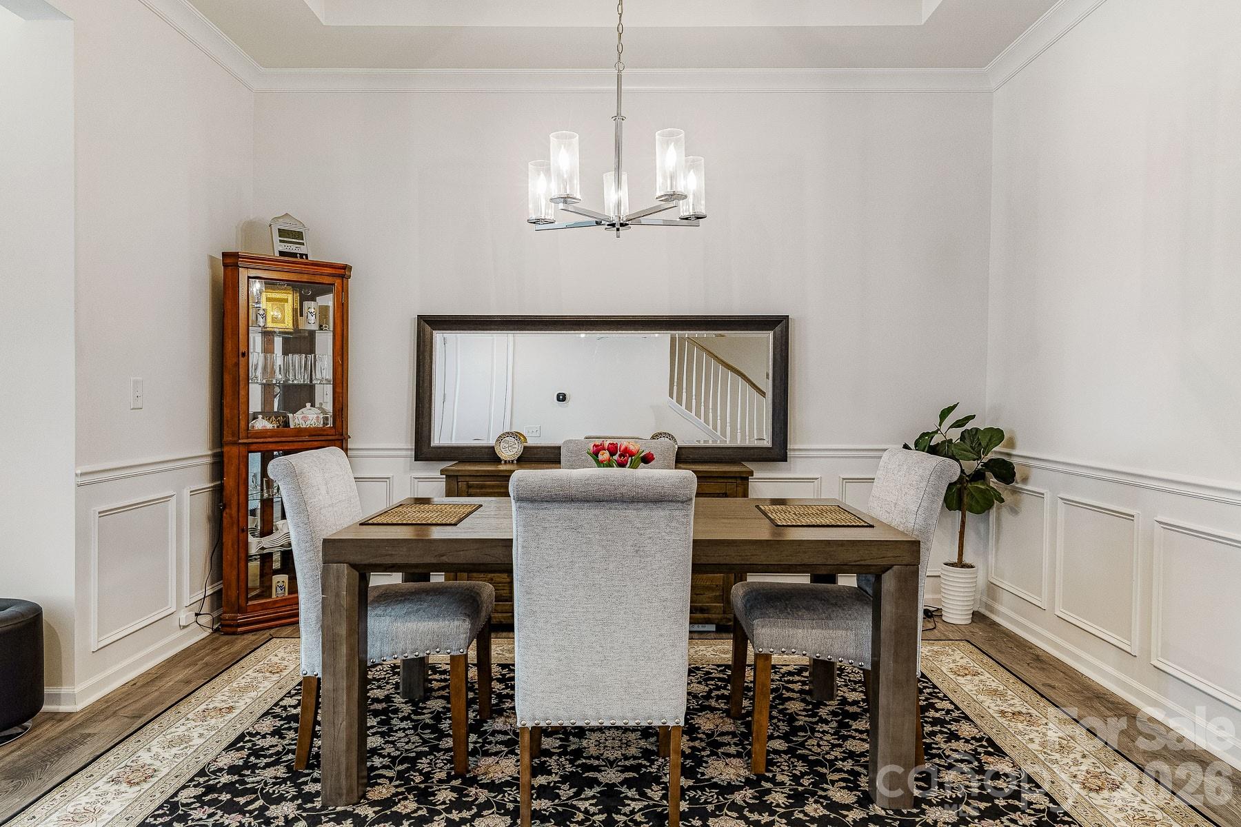 2036 Oliver Terrace Fort Mill, SC 29707 - Photo 6 of 41 a view of a dining room with furniture and a chandelier