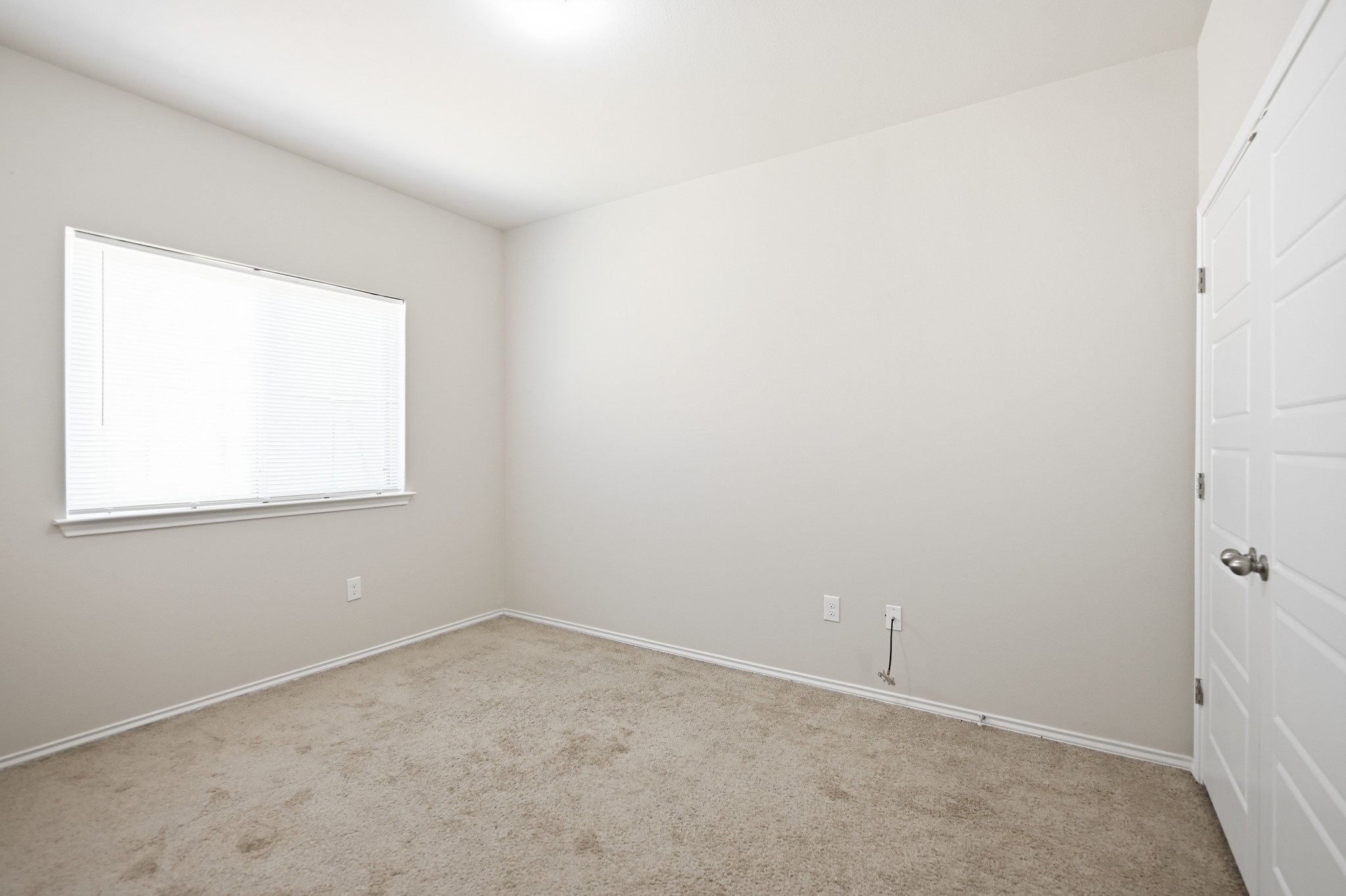 1733 Davidson Ranch Road Georgetown, TX 78626 - Photo 21 of 33 A quiet bedroom features plush carpeting and a large window.