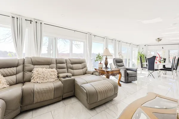 a view of a living room and a window