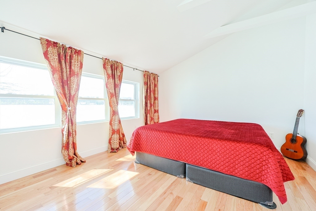 207 White Pond Road Lancaster, MA 01523 - Photo 17 of 38 a bedroom with a bed and a window