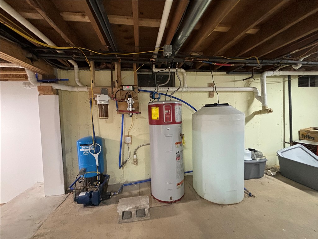 172 Hawks Road Pittsfield, NY 13411 - Photo 32 of 45 Blue Pressure tank, hot water tank, and storage wa