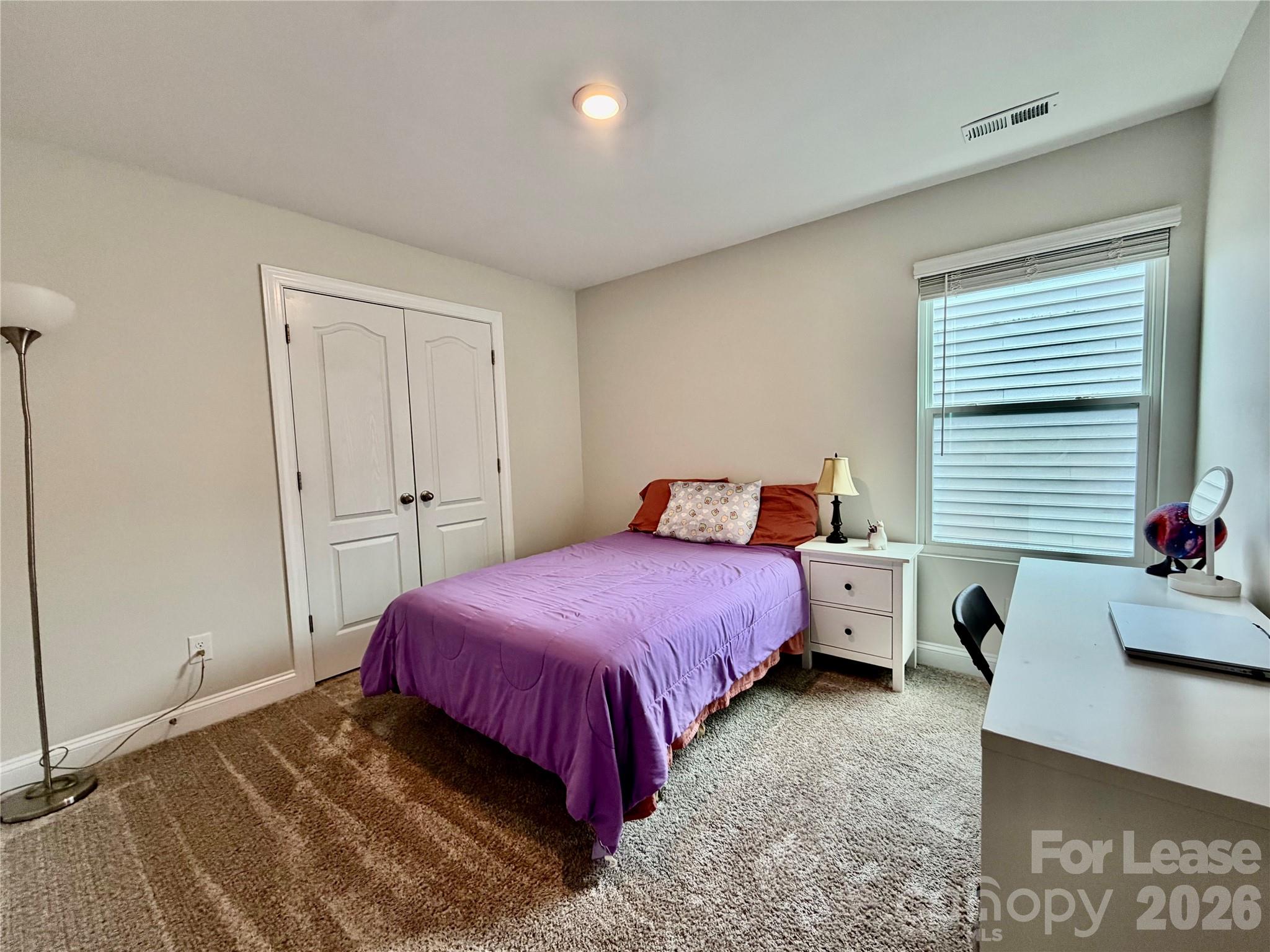 1220 Pecan Ridge Road Fort Mill, SC 29715 - Photo 18 of 25 a bedroom with a bed and a window