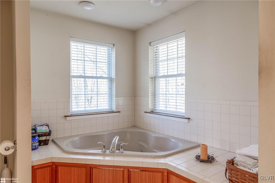 269 Germanville Road Ashland, PA 17921 - Photo 17 of 36 a bathroom with a tub sink and window