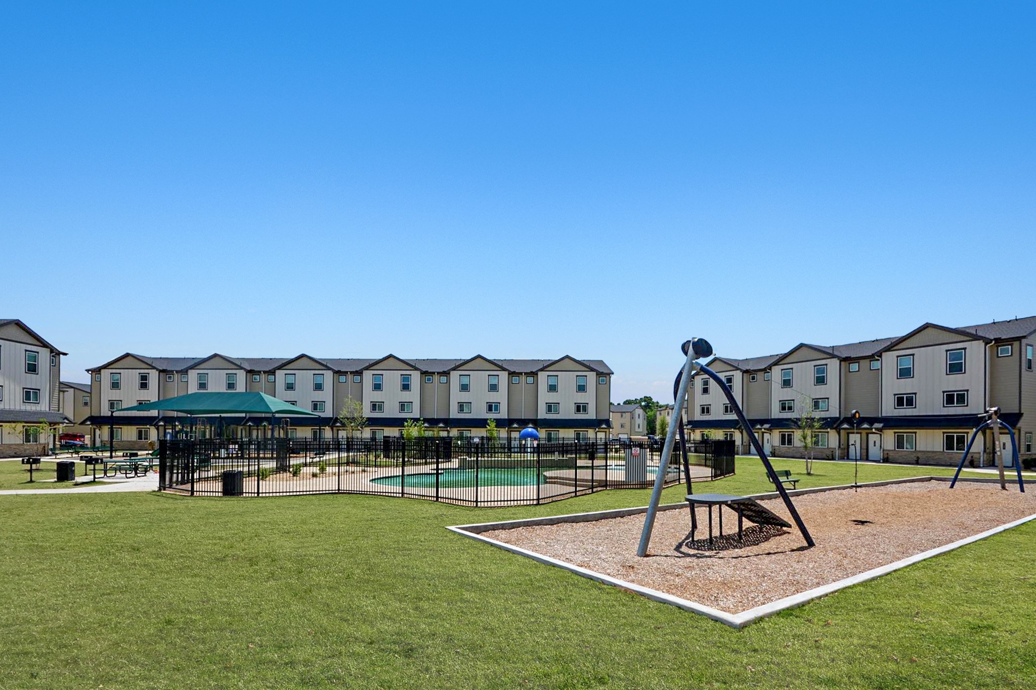 12603 Telge Road, Unit 8EH Cypress, TX 77429 - Photo 6 of 32 a view of a house with a garden and a table
