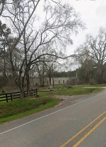 a view of a playground with basketball court