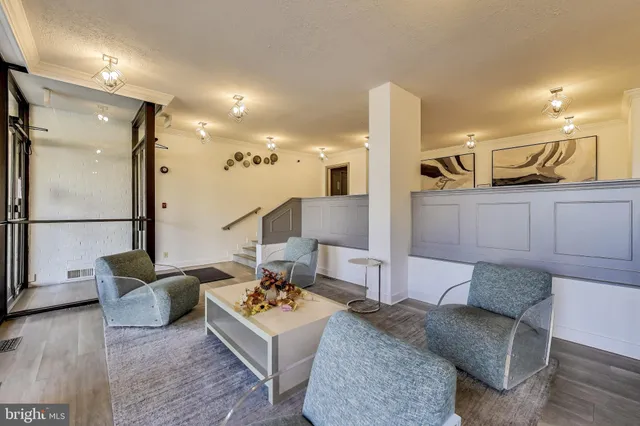 a room with gym equipment and large window