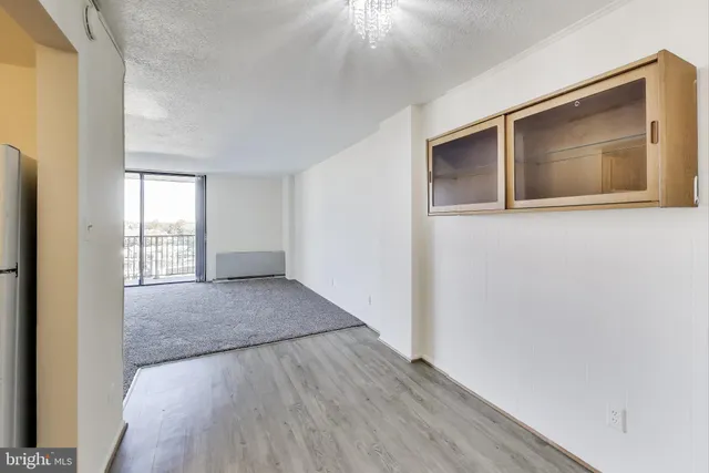 a view of an empty room and window