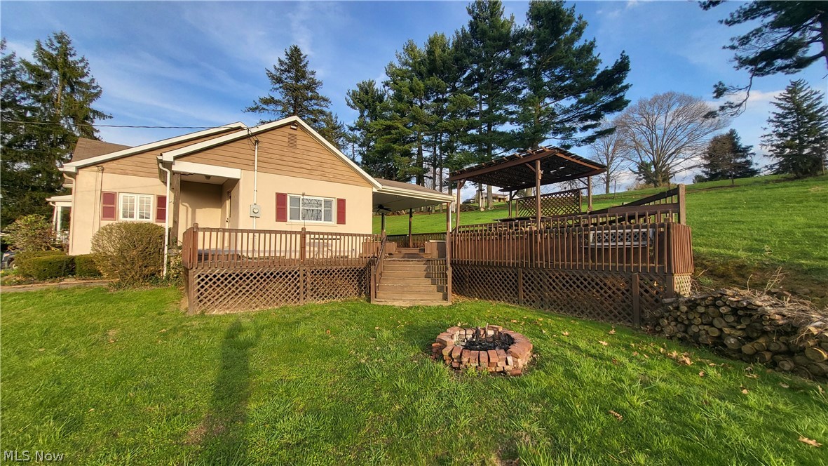 72238 Colerain Road Bridgeport, OH 43912 - Photo 10 of 30 View of yard featuring a deck and a gazebo