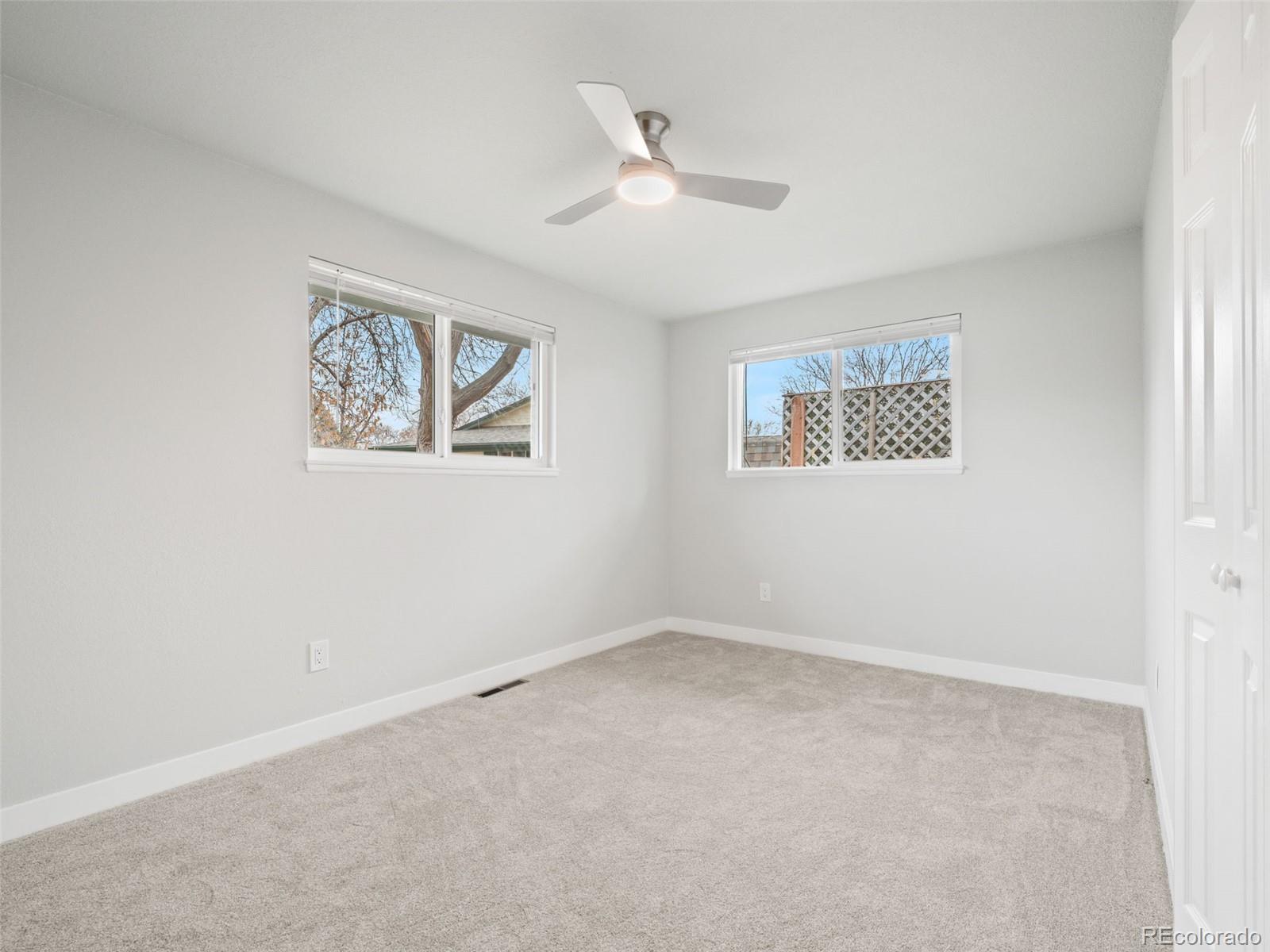 1035 6th Street Berthoud, CO 80513 - Photo 18 of 30 an empty room with a window