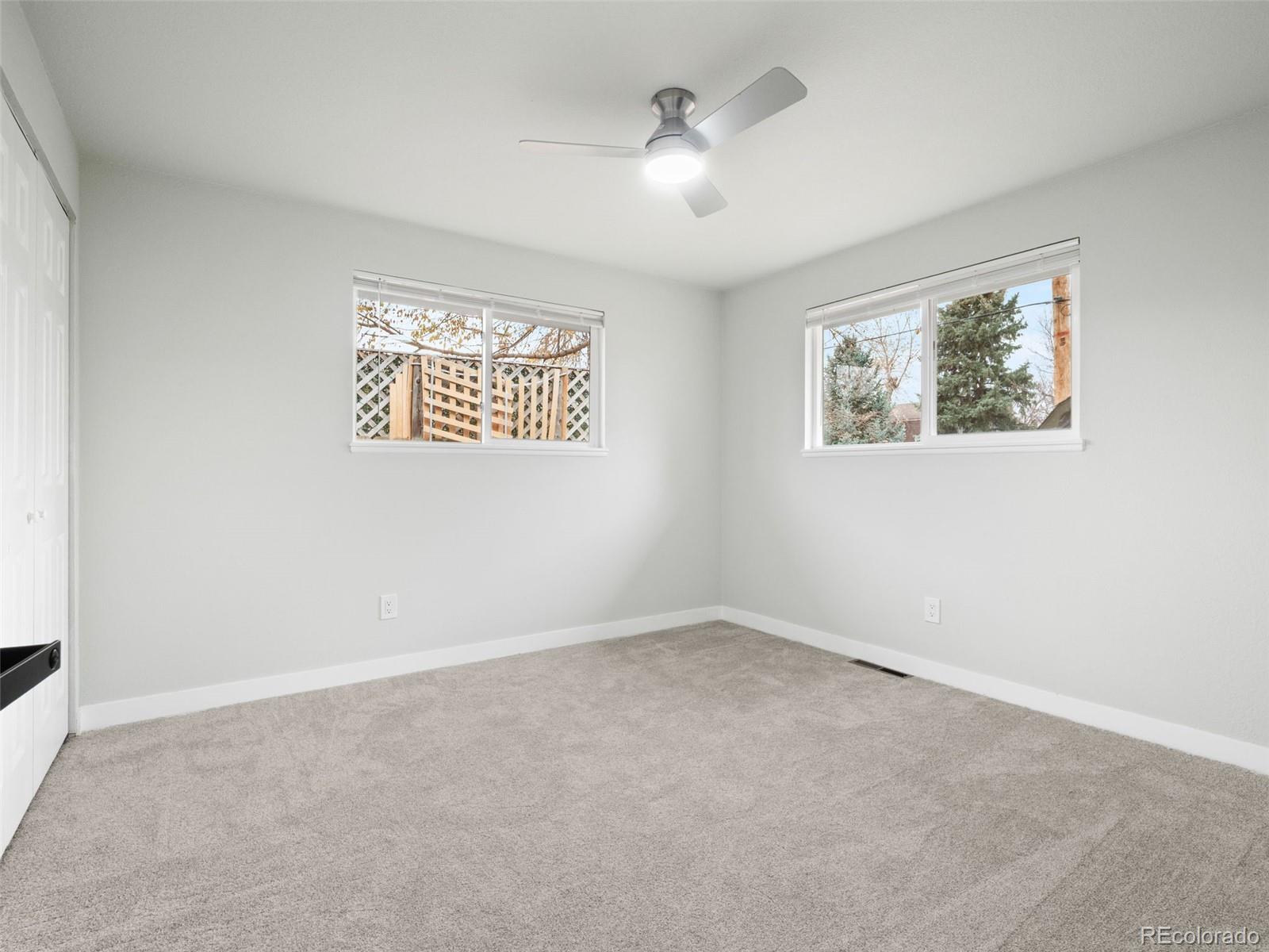 1035 6th Street Berthoud, CO 80513 - Photo 19 of 30 an empty room with a window