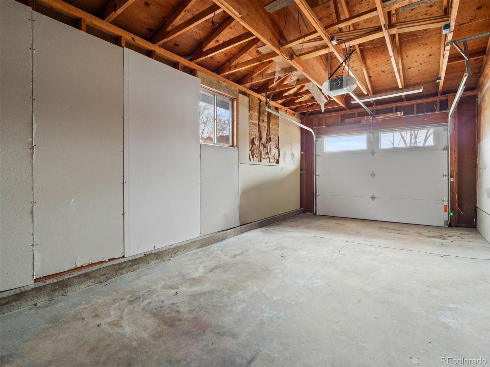 1035 6th Street Berthoud, CO 80513 - Photo 23 of 30 a view of a room with wooden walls